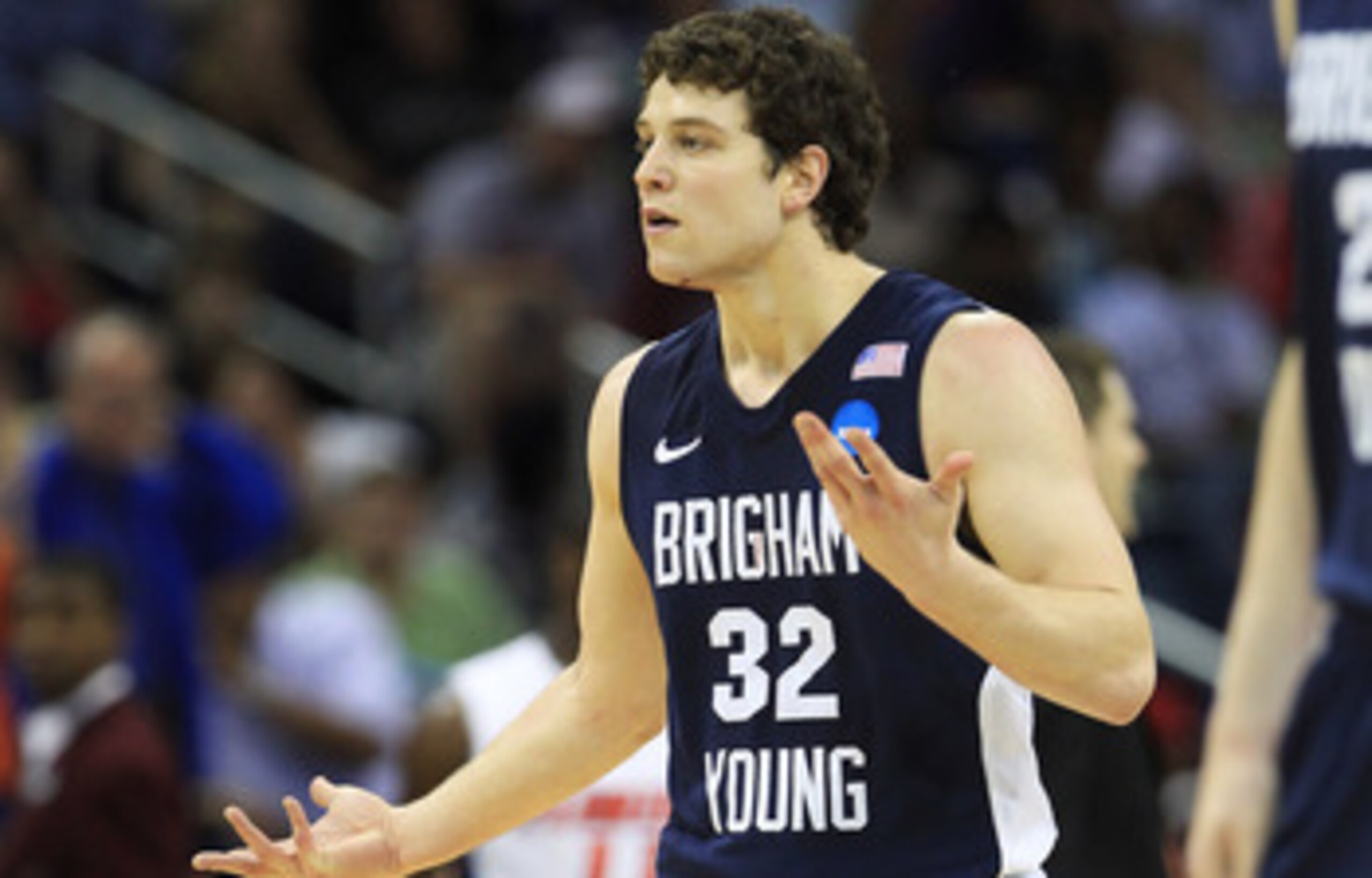 DENVER, CO - MARCH 17:  Jimmer Fredette #32 of the Brigham Young Cougars reacts to a call while playing against the Wofford Terriers during the second round of the 2011 NCAA men's basketball tournament at Pepsi Center on March 17, 2011 in Denver, Colorado