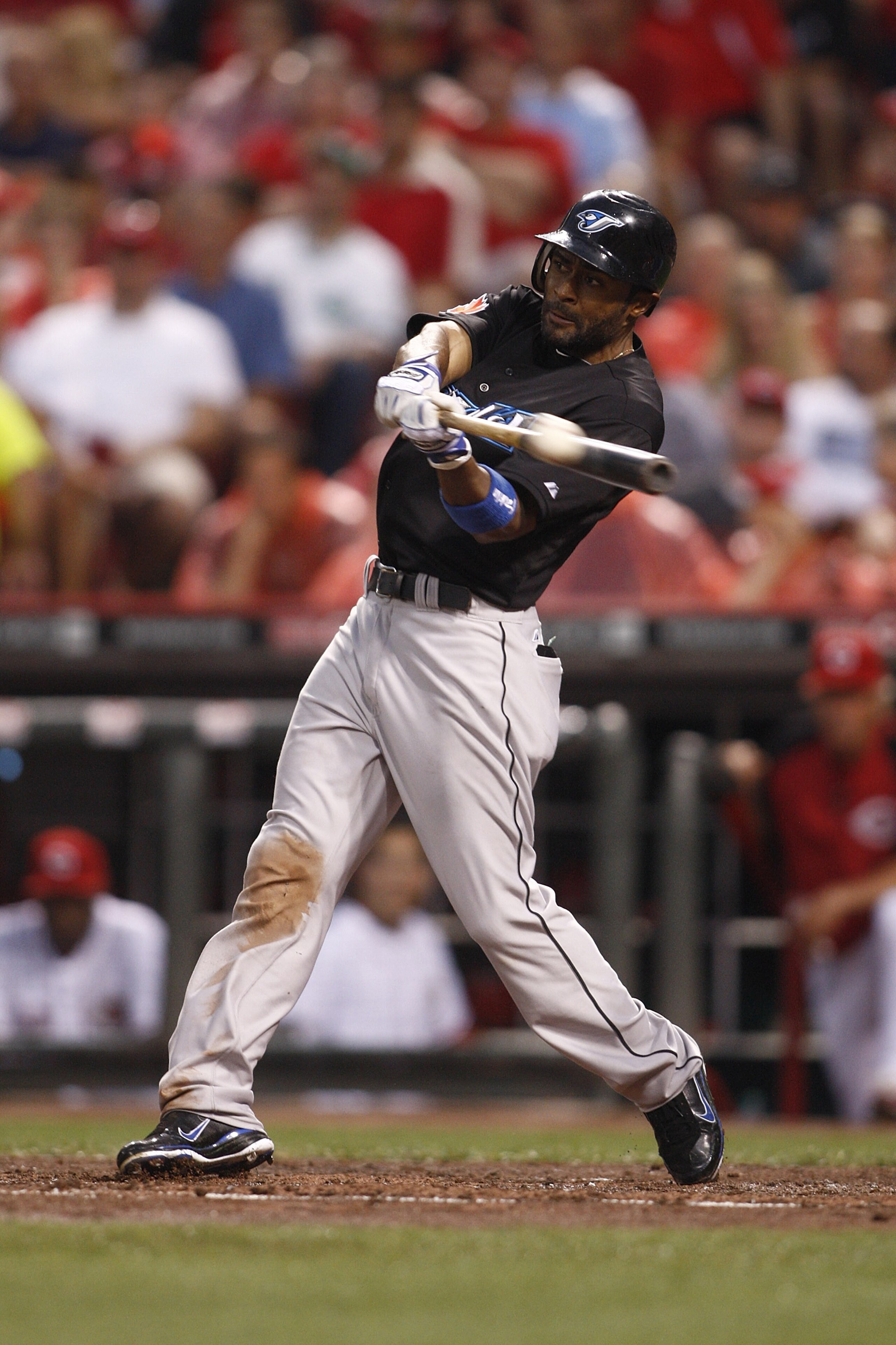 CINCINNATI, OH - JUNE 18:   Corey Patterson #16 of the Toronto Blue Jays connects with a pitch during the game against the Cincinnati Reds on June 18, 2011 at Great American Ball Park in Cincinnati, Ohio.  The Toronto Blue Jays defeated the Cincinnati Red
