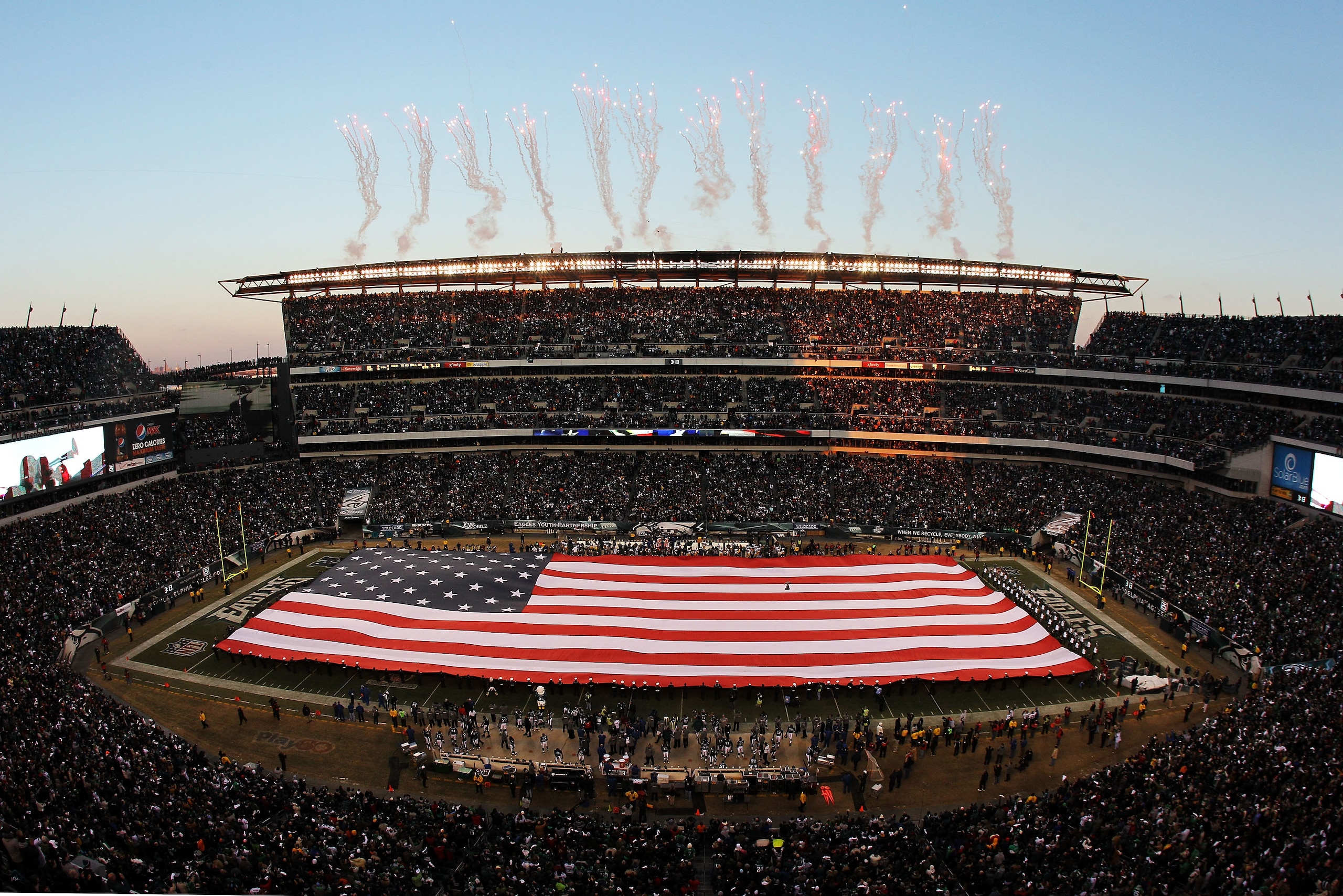 PHILADELPHIA, PA - JANUARY 09:  The color guard presents a full field flag for the national anthem before the game between the Green Bay Packers and the Philadelphia Eagles in the 2011 NFC wild card playoff game at Lincoln Financial Field on January 9, 20