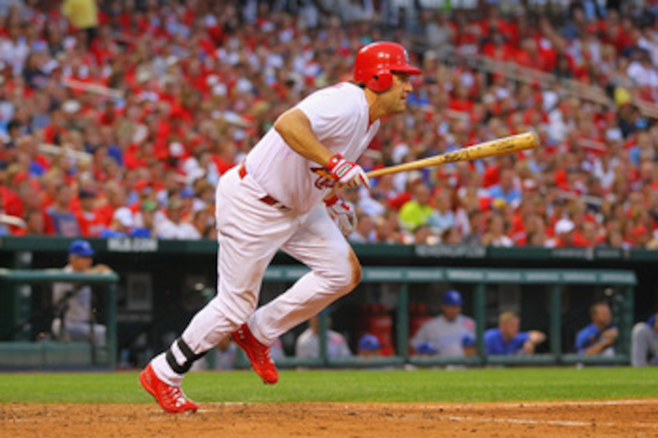 ST. LOUIS, MO - JUNE 17: Lance Berkman #12 of the St. Louis Cardinals hits a three-RBI double against the Kansas City Royals at Busch Stadium on June 17, 2011 in St. Louis, Missouri.  (Photo by Dilip Vishwanat/Getty Images)