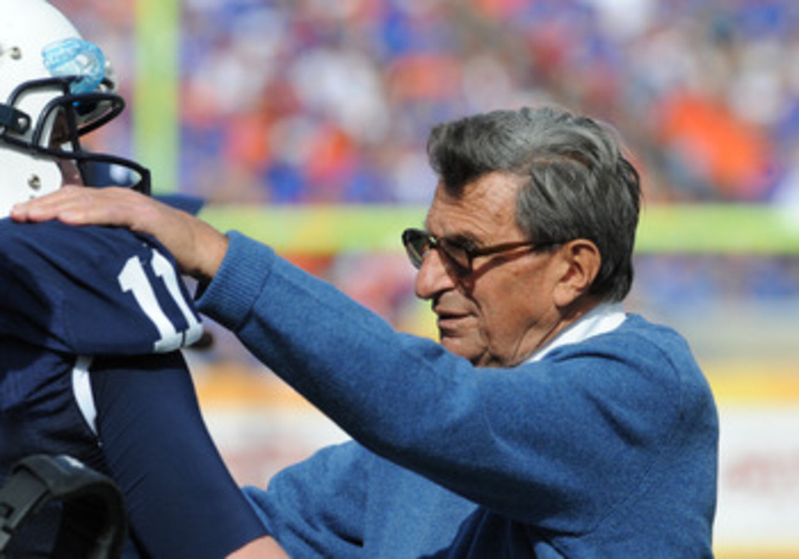 TAMPA, FL - JANUARY 1:  Coach Joe Paterno of the Penn State Nittany Lions directs play of quarterback Matt McGloin #11 against the Florida Gators January 1, 2010 in the 25th Outback Bowl at Raymond James Stadium in Tampa, Florida.  (Photo by Al Messerschm