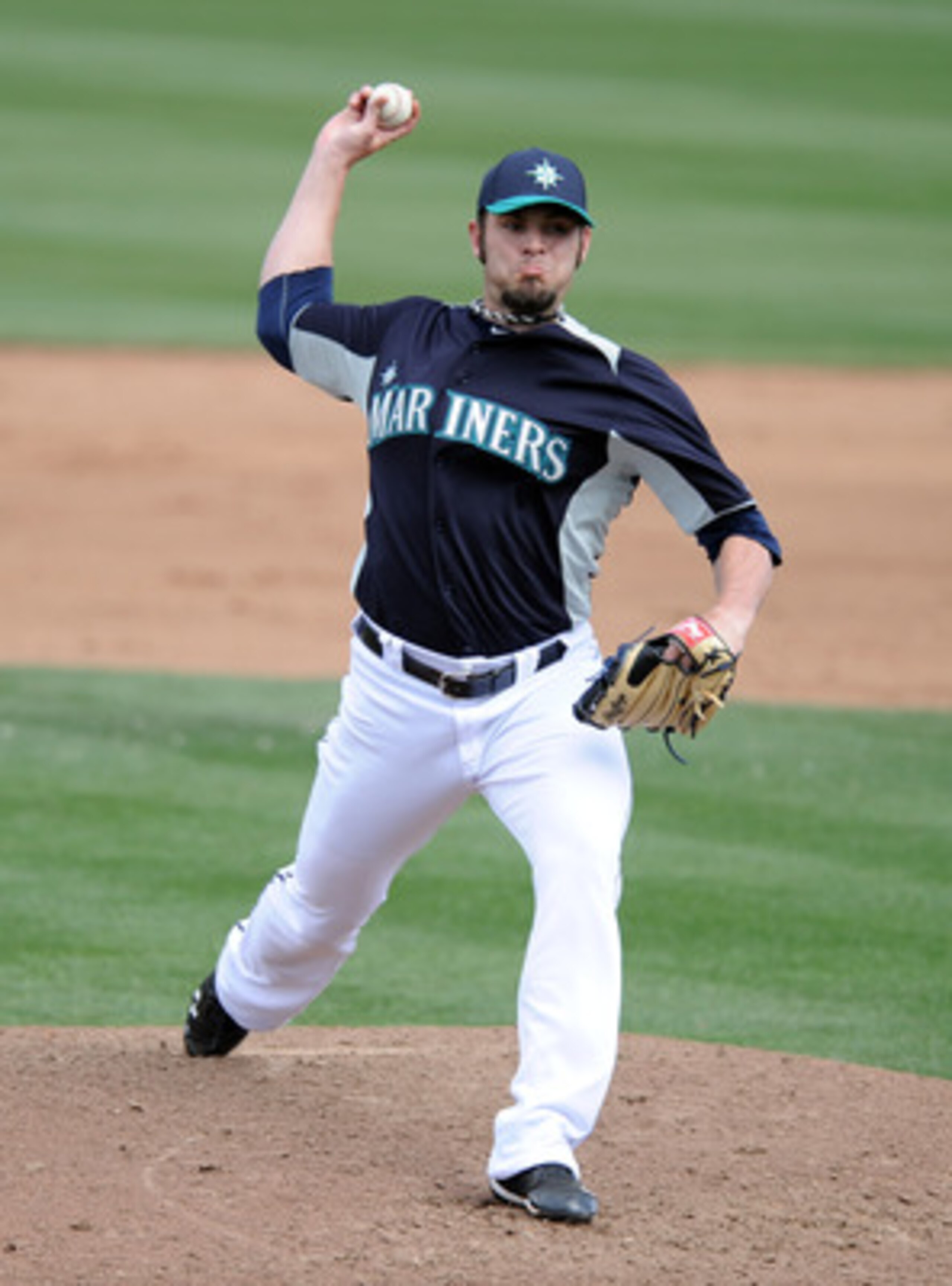 PEORIA, AZ - MARCH 01:  Josh Lueke #71 of the Seattle Mariners pitches during spring training at Peoria Stadium on March 1, 2011 in Peoria, Arizona.  (Photo by Harry How/Getty Images)