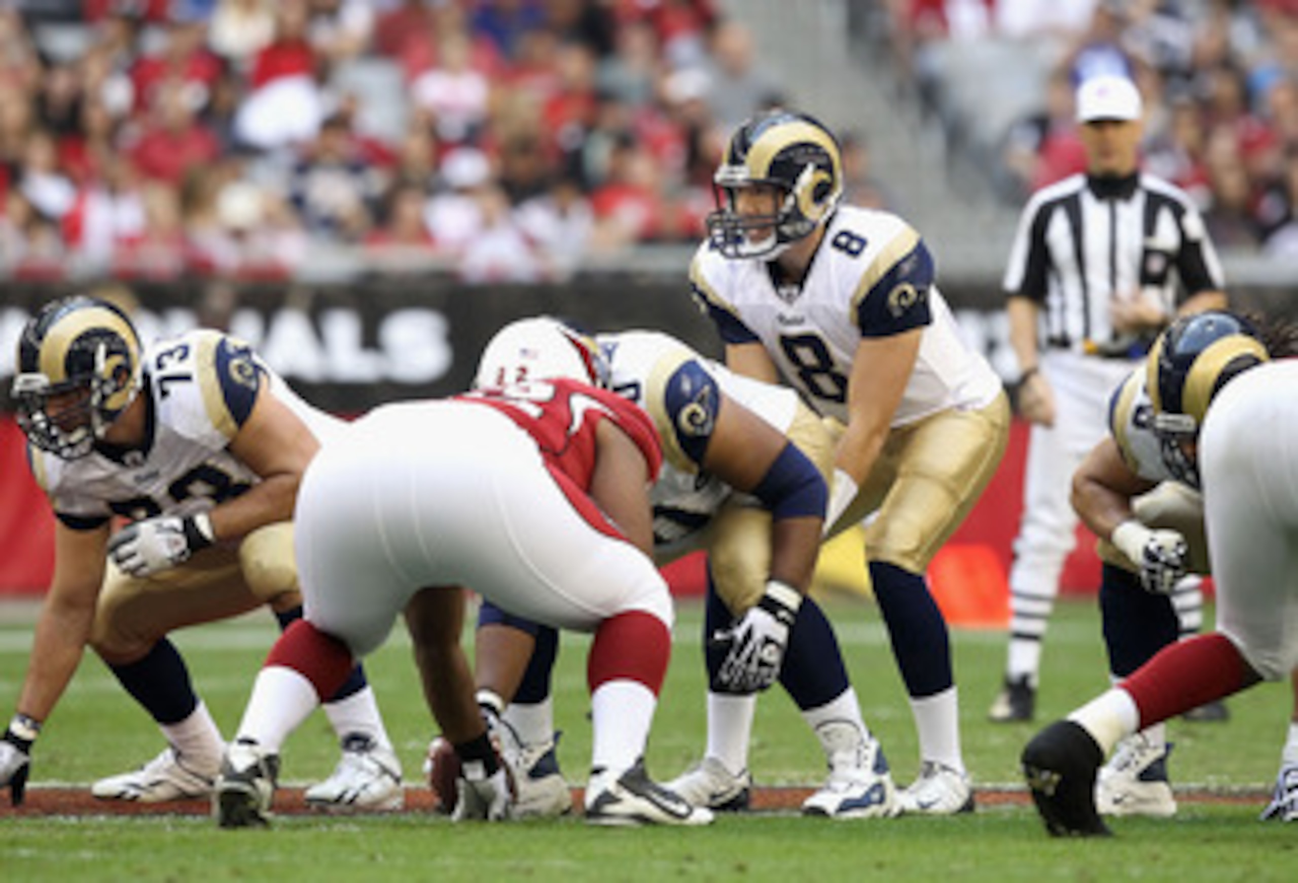 GLENDALE, AZ - DECEMBER 05: Quarterback Sam Bradford #8 of the St. Louis Rams prepares to snap the ball during the NFL game against the Arizona Cardinals at the University of Phoenix Stadium on December 5, 2010 in Glendale, Arizona. The Rams defeated th GLENDALE, AZ - DECEMBER 05: Quarterback Sam Bradford #8 of the St. Louis Rams prepares to snap the ball during the NFL game against the Arizona Cardinals at the University of Phoenix Stadium on December 5, 2010 in Glendale, Arizona. The Rams defeated th