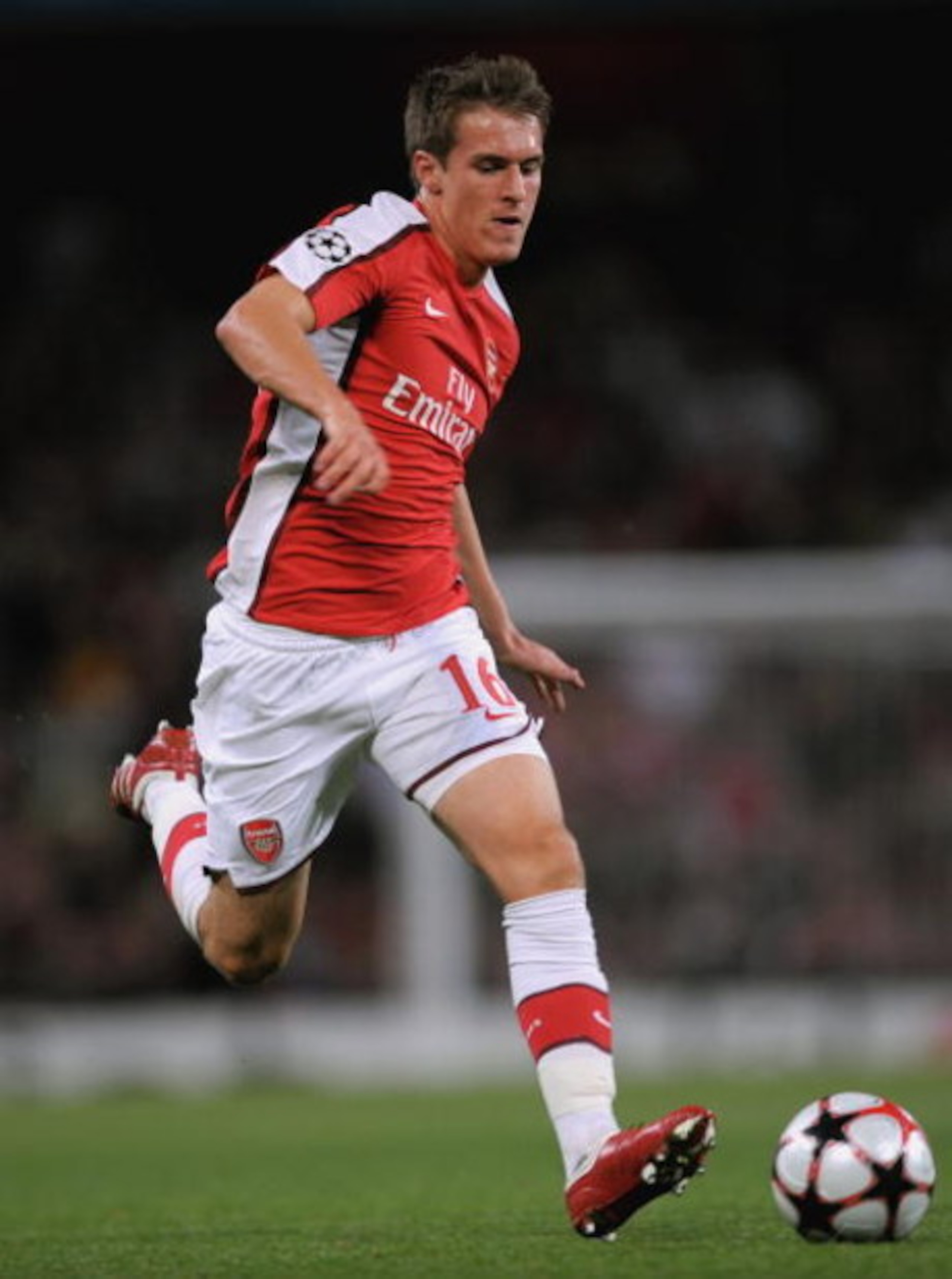 LONDON, ENGLAND - AUGUST 26:  Aaron Ramsey of Arsenal runs with the ball during the UEFA Champions League 2nd qualifying round 2nd leg match between Arsenal and Celtic at the Emirates Stadium on August 26, 2009 in London, England.  (Photo by Shaun Botteri