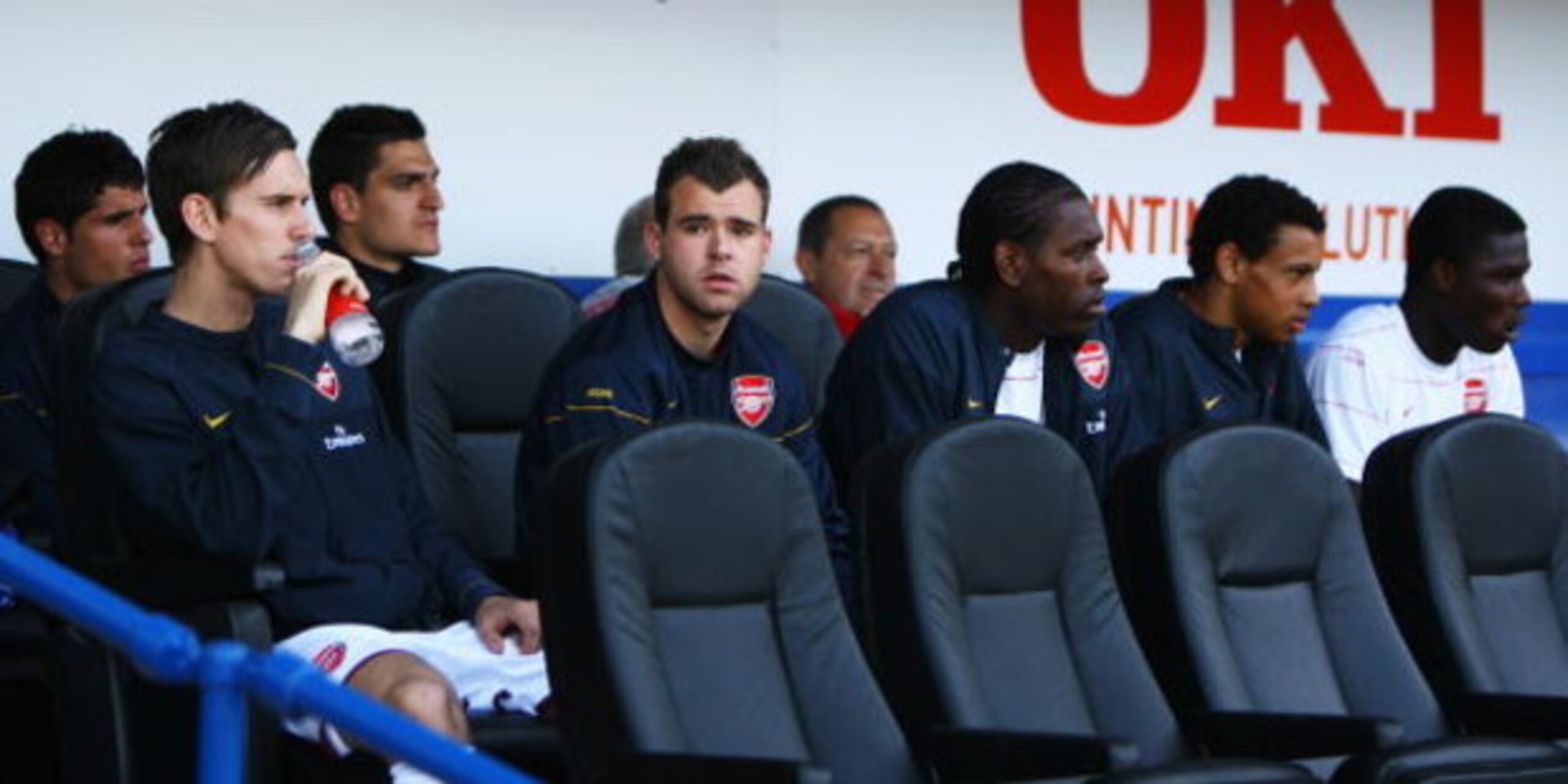 PORTSMOUTH, UNITED KINGDOM - MAY 02:  (L-R) Fran Marida, Mark Randall, Vito Mannone, Amaury Bischoff, Jay Thomas, Francis Coquelin and Emmanuel Frimpong of Arsenal look on from the bench prior to the Barclays Premier League match between Portsmouth and Ar
