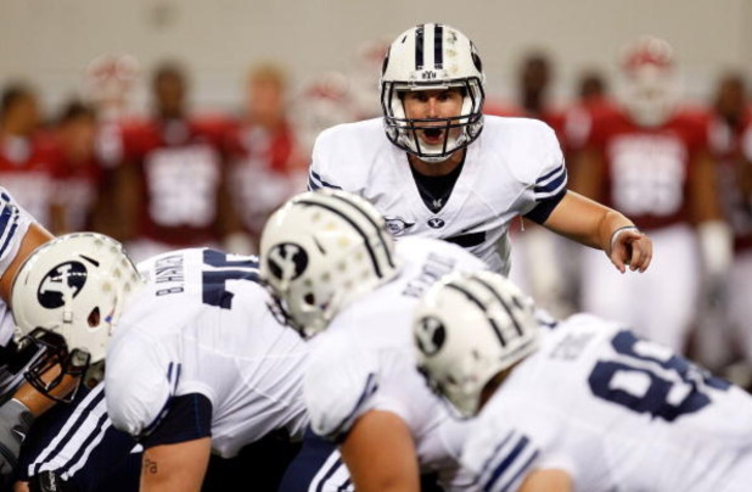 ARLINGTON, TX - SEPTEMBER 05:  Quarterback Max Hall #15 of the Brigham Young Cougars drops back to pass against the Oklahoma Sooners at Cowboys Stadium on September 5, 2009 in Arlington, Texas.  (Photo by Ronald Martinez/Getty Images)