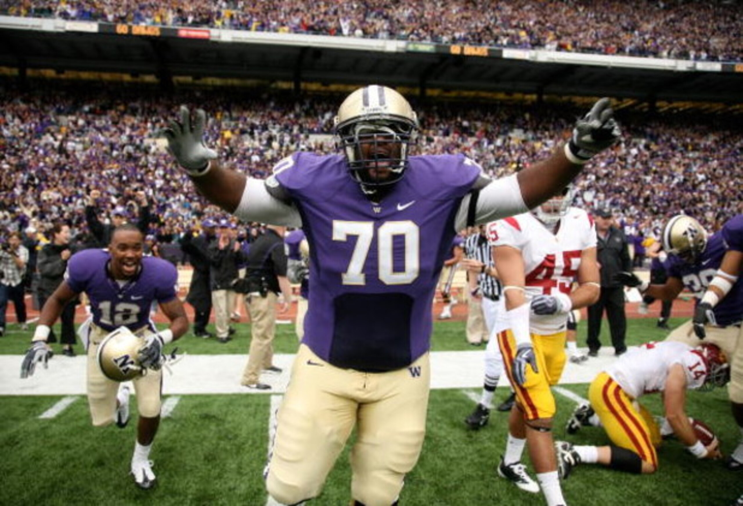 SEATTLE - SEPTEMBER 19:  Offensive guard Morgan Rosborough #70 of the Washington Huskies celebrates as time expires against the USC Trojans on September 19, 2009 at Husky Stadium in Seattle, Washington. The Huskies defeated the Trojans 16-13. (Photo by Ot