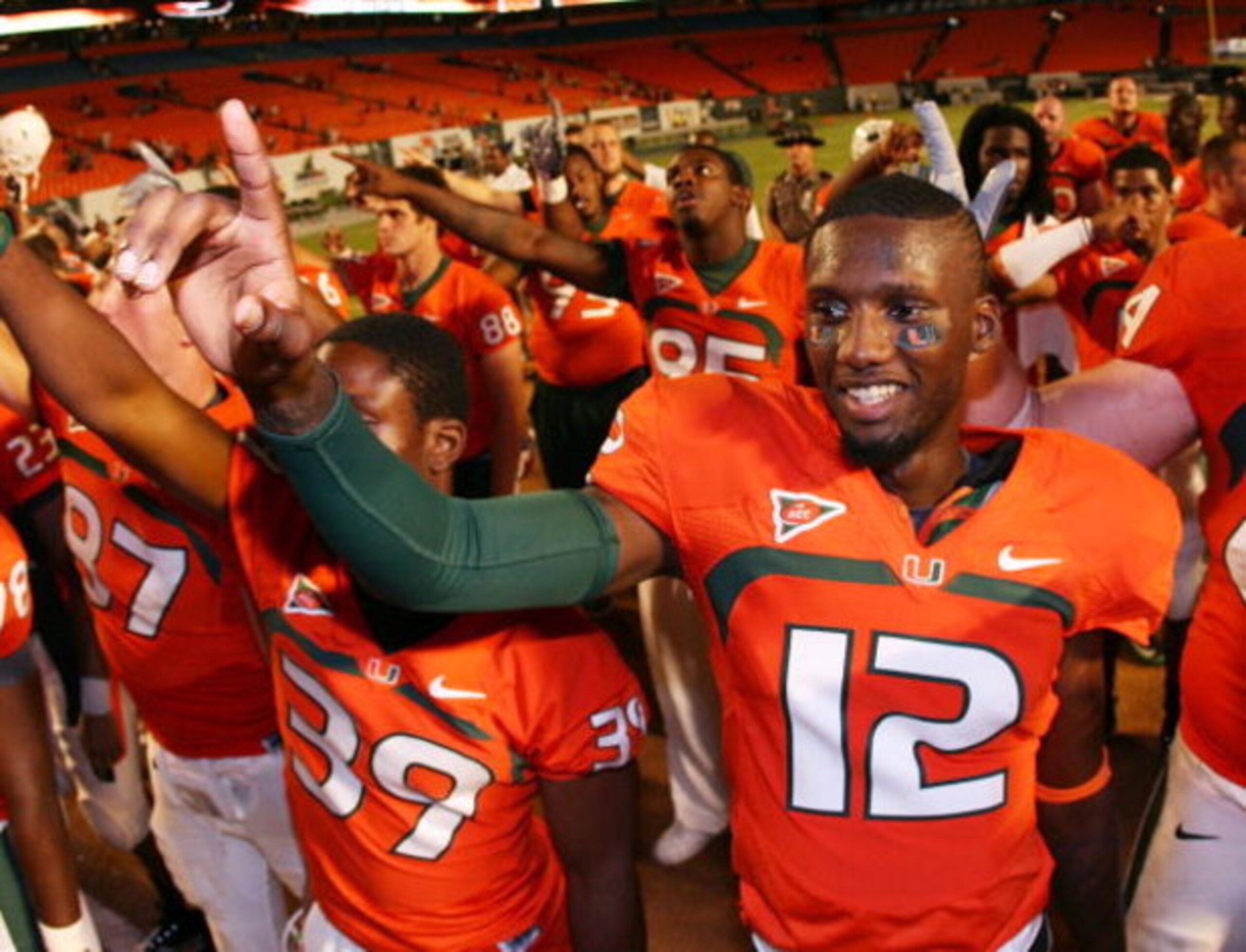 FORT LAUDERDALE, FL - SEPTEMBER 17:  Quarterback Jacory Harris #12 of the Miami Hurricanes celebrates after defeating the Georgia Tech Yellow Jackets at Land Shark Stadium on September 17, 2009 in Fort Lauderdale, Florida. Miami defeated Georgia Tech 33-1