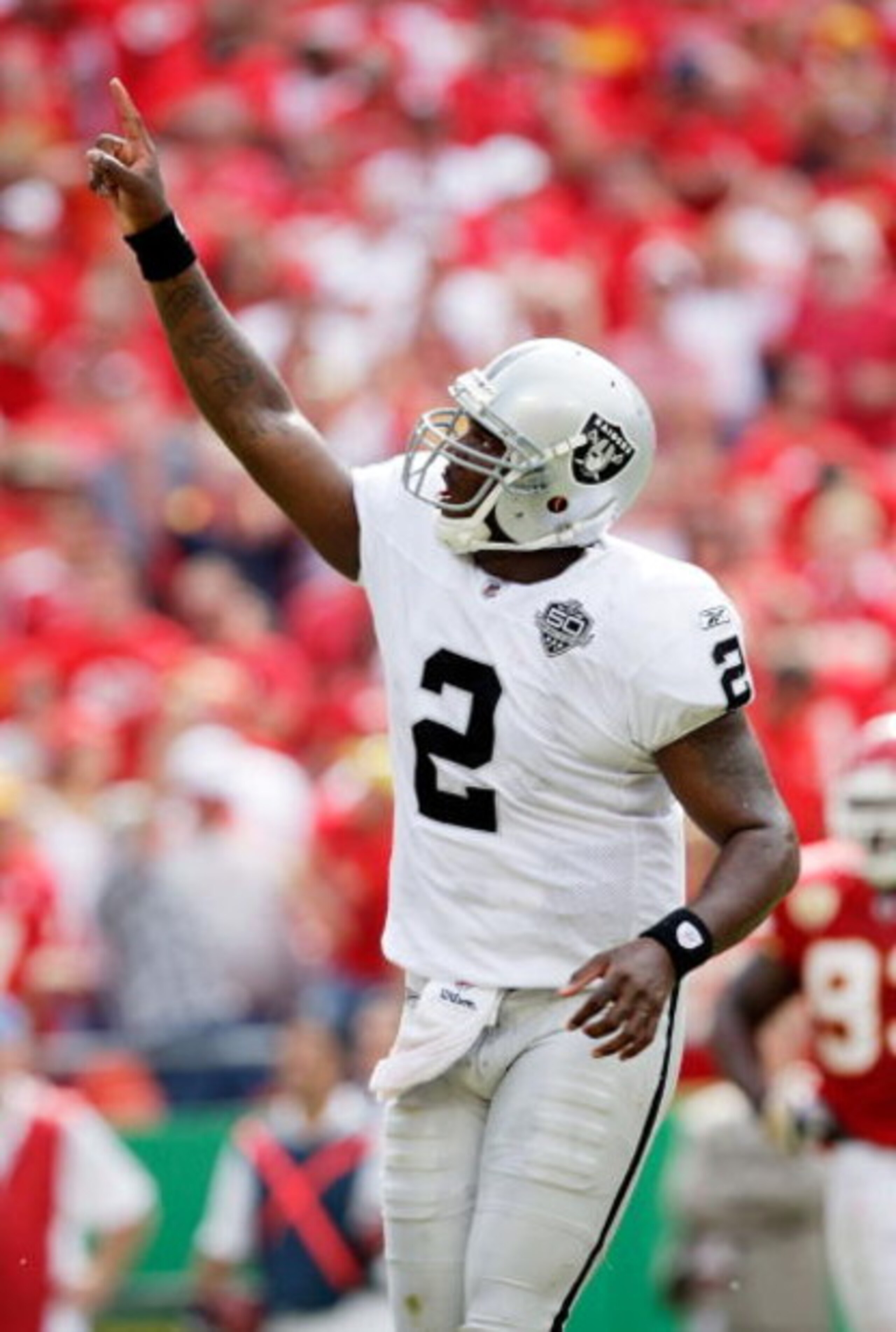 KANSAS CITY, MO - SEPTEMBER 20:  Quarterback JaMarcus Russell #2 of the Oakland Raiders celebrates after handing off for a touchdown in the final minutes of the 4th quarter during the Raiders' 13-10 victory over the Kansas City Chiefs during the game at A