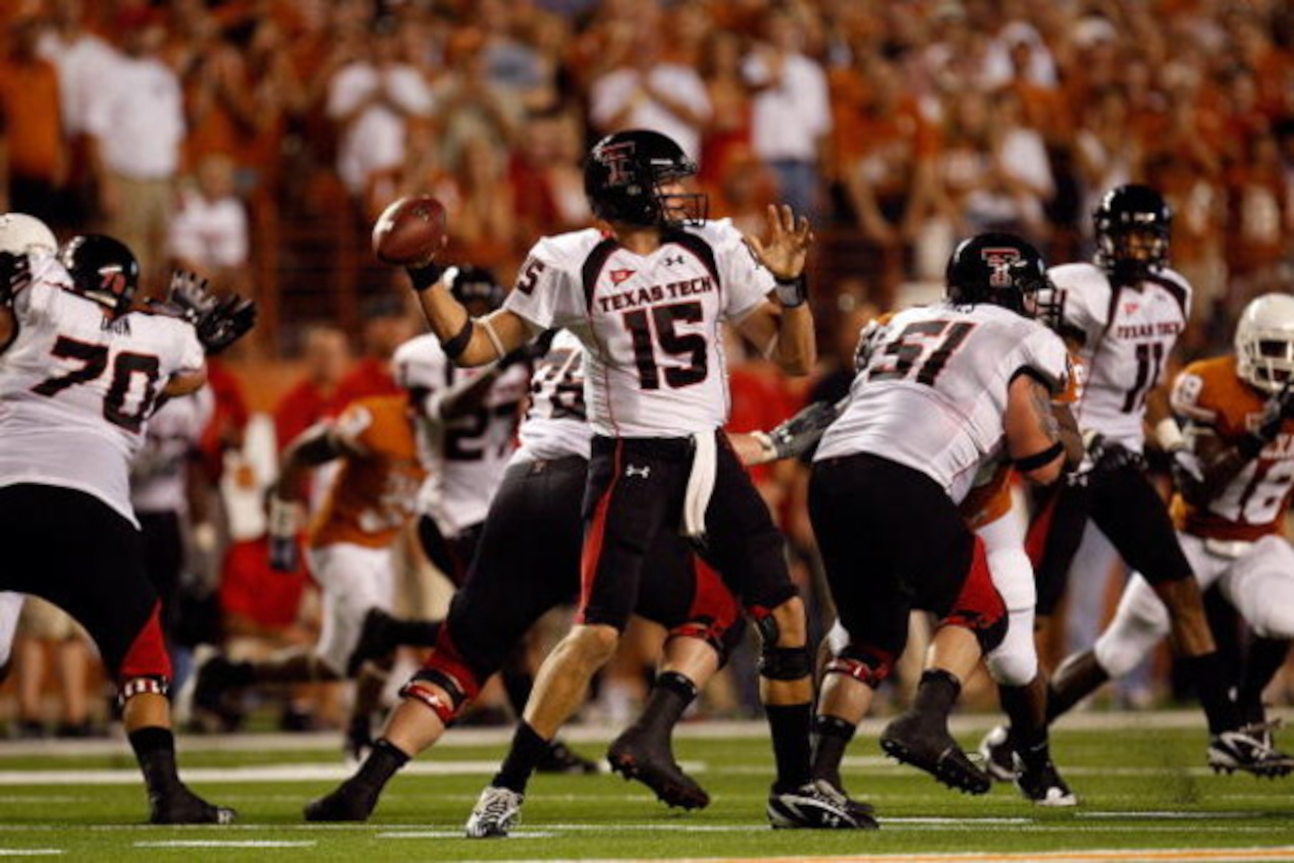 AUSTIN, TX - SEPTEMBER 19: Quarterback Taylor Potts #15 of the Texas Tech Red Raiders drops back to pass against the Texas Longhorns at Darrell K Royal-Texas Memorial Stadium on September 19, 2009 in Austin, Texas. (Photo by Ronald Martinez/Getty Images AUSTIN, TX - SEPTEMBER 19: Quarterback Taylor Potts #15 of the Texas Tech Red Raiders drops back to pass against the Texas Longhorns at Darrell K Royal-Texas Memorial Stadium on September 19, 2009 in Austin, Texas. (Photo by Ronald Martinez/Getty Images