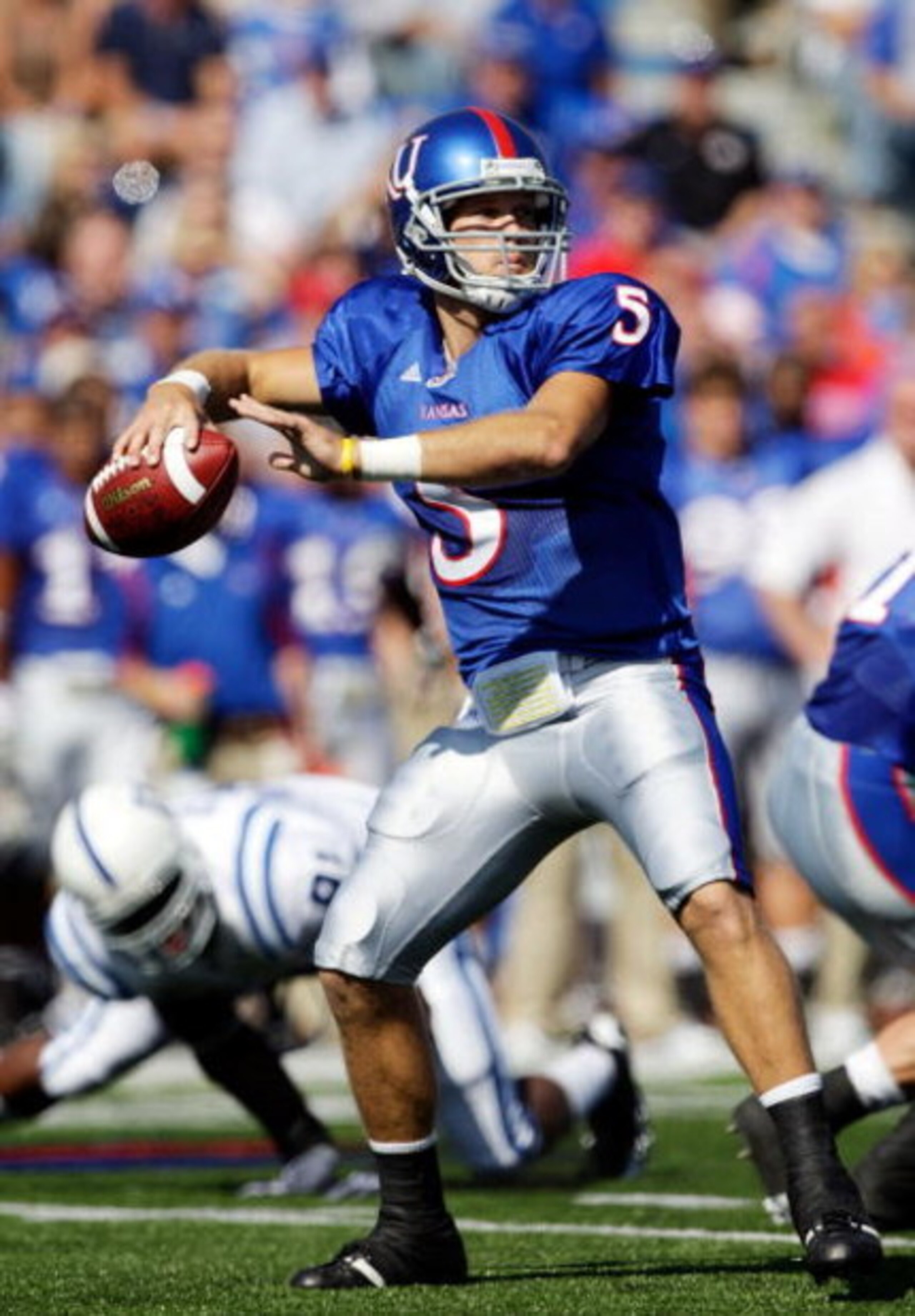 LAWRENCE, KS - SEPTEMBER 19:  Quarterback Todd Reesing #5 of the Kansas Jayhawks passes during the game against the Duke Blue Devils on Kivisto Field at Memorial Stadium on September 19, 2009 in Lawrence, Kansas.  (Photo by Jamie Squire/Getty Images)