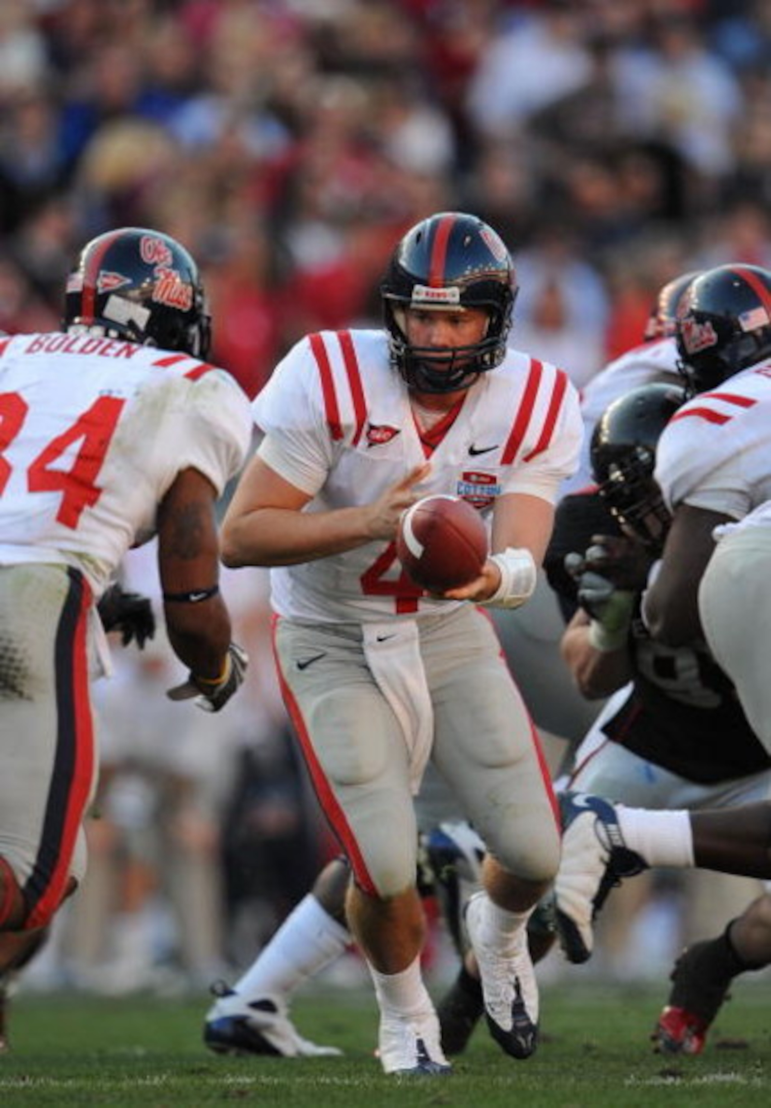 DALLAS - JANUARY 02: Quarterback Jevan Snead #4 of the Mississippi Rebels drops back to pass against the Texas Tech Red Raiders during the AT&T Cotton Bowl on January 2, 2009 at the Cotton Bowl in Dallas, Texas. (Photo by Ronald Martinez/Getty Images) DALLAS - JANUARY 02: Quarterback Jevan Snead #4 of the Mississippi Rebels drops back to pass against the Texas Tech Red Raiders during the AT&T Cotton Bowl on January 2, 2009 at the Cotton Bowl in Dallas, Texas. (Photo by Ronald Martinez/Getty Images)
