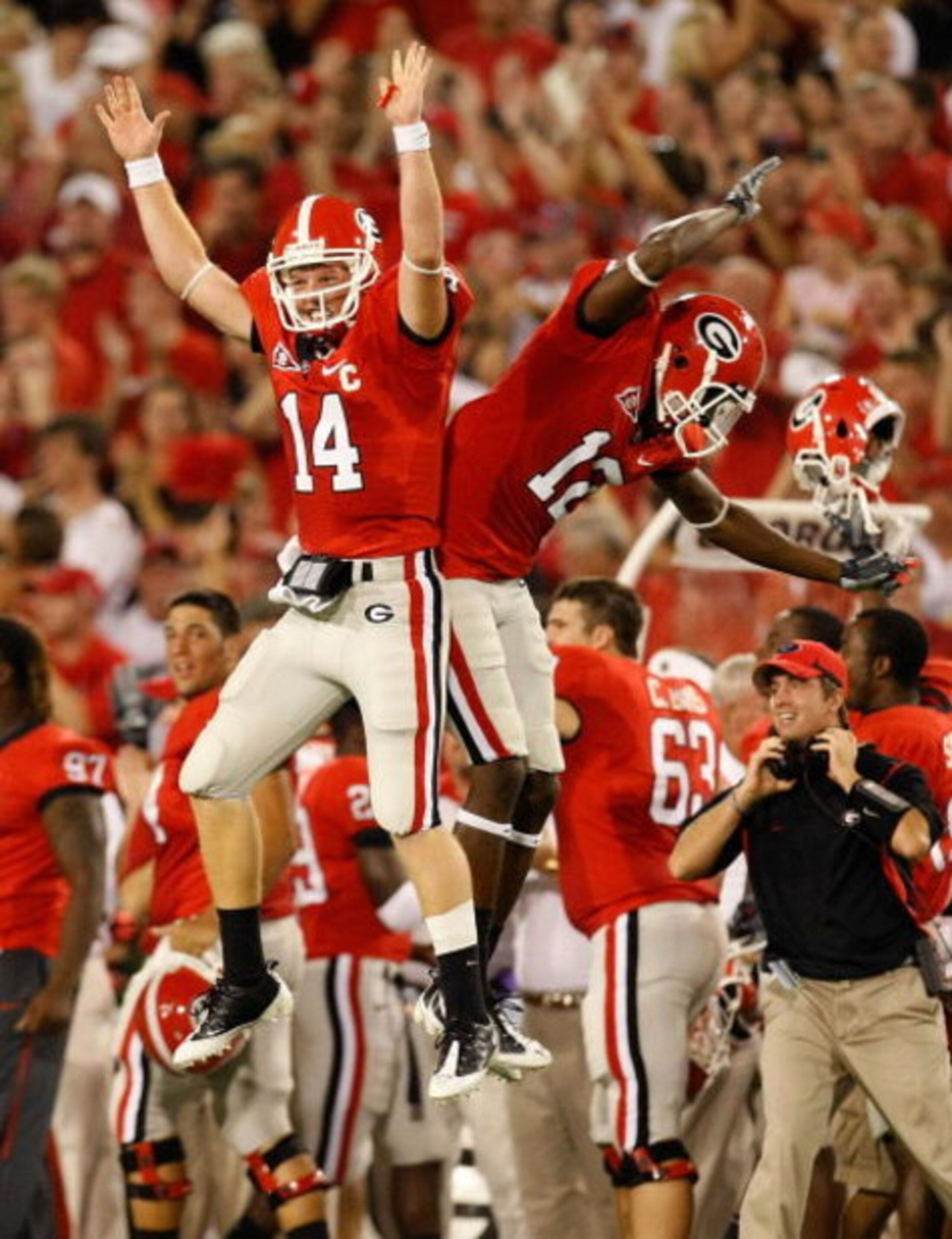 ATHENS, GA - SEPTEMBER 12:  Quarterback Joe Cox #14 and Tavarres King #12 celebrate a touchdown against the Georgia Bulldogs of the South Carolina Gamecocks at Sanford Stadium on September 12, 2009 in Athens, Georgia.  (Photo by Kevin C. Cox/Getty Images)