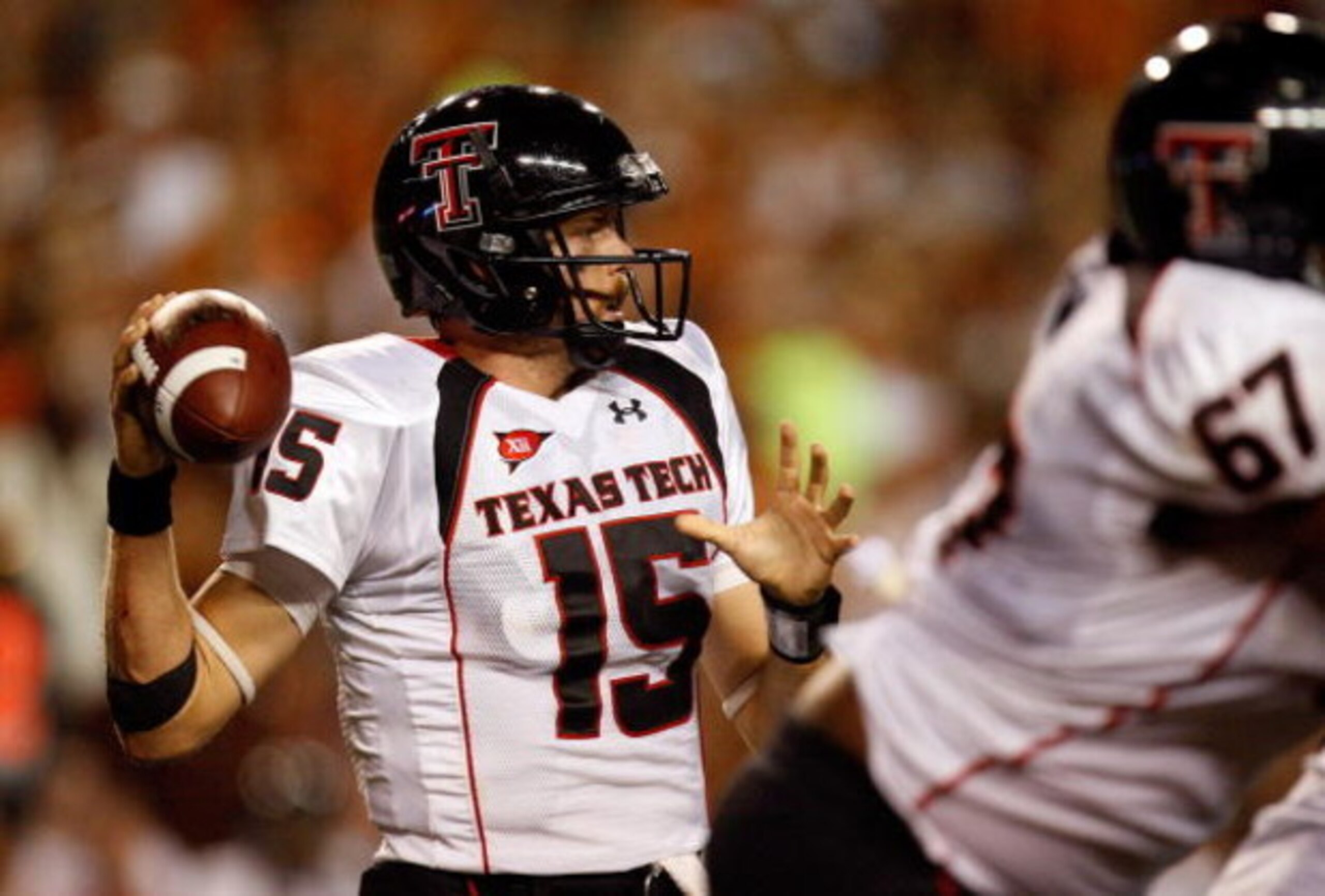 AUSTIN, TX - SEPTEMBER 19:  Quarterback Taylor Potts #15 of the Texas Tech Red Raiders drops back to pass against the Texas Longhorns at Darrell K Royal-Texas Memorial Stadium on September 19, 2009 in Austin, Texas.  (Photo by Ronald Martinez/Getty Images