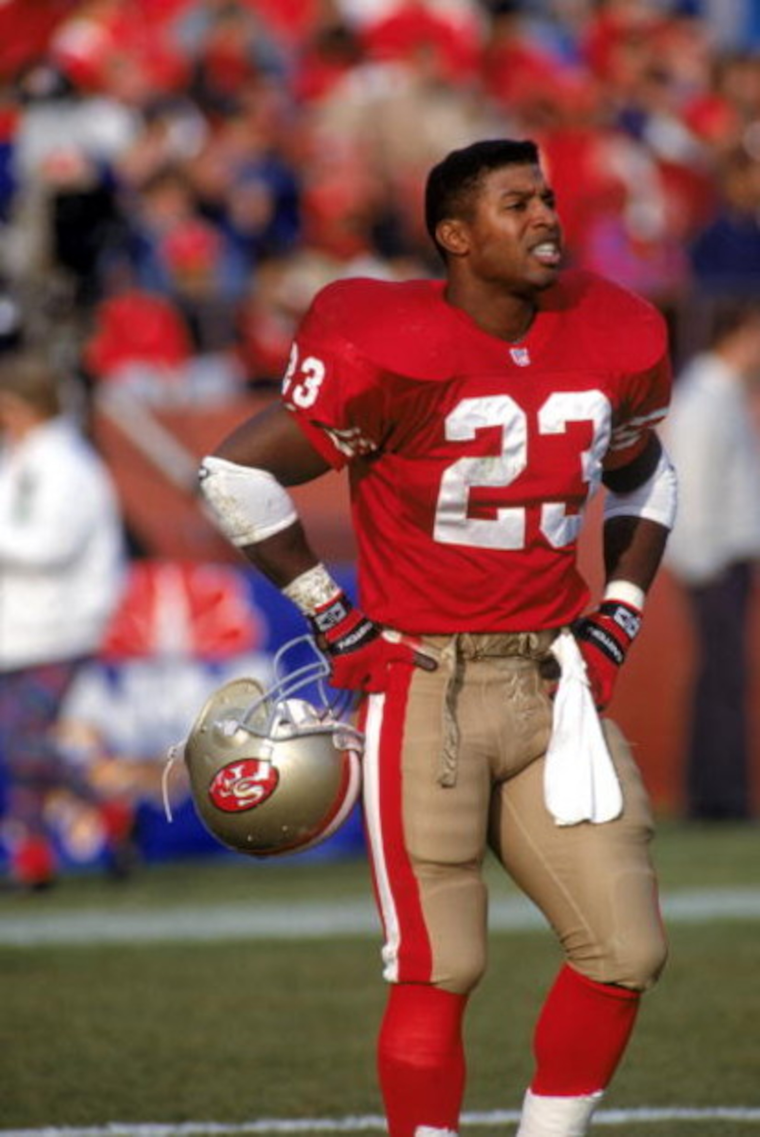 SAN FRANCISCO - DECEMBER 14:  Spencer Tillman #23 of the San Francisco 49ers stands on the field during a game against the Kansas City Chiefs at Candlestick Park on December 14, 1991 in San Francisco, California.  The 49ers won 28-14.  (Photo by George Ro