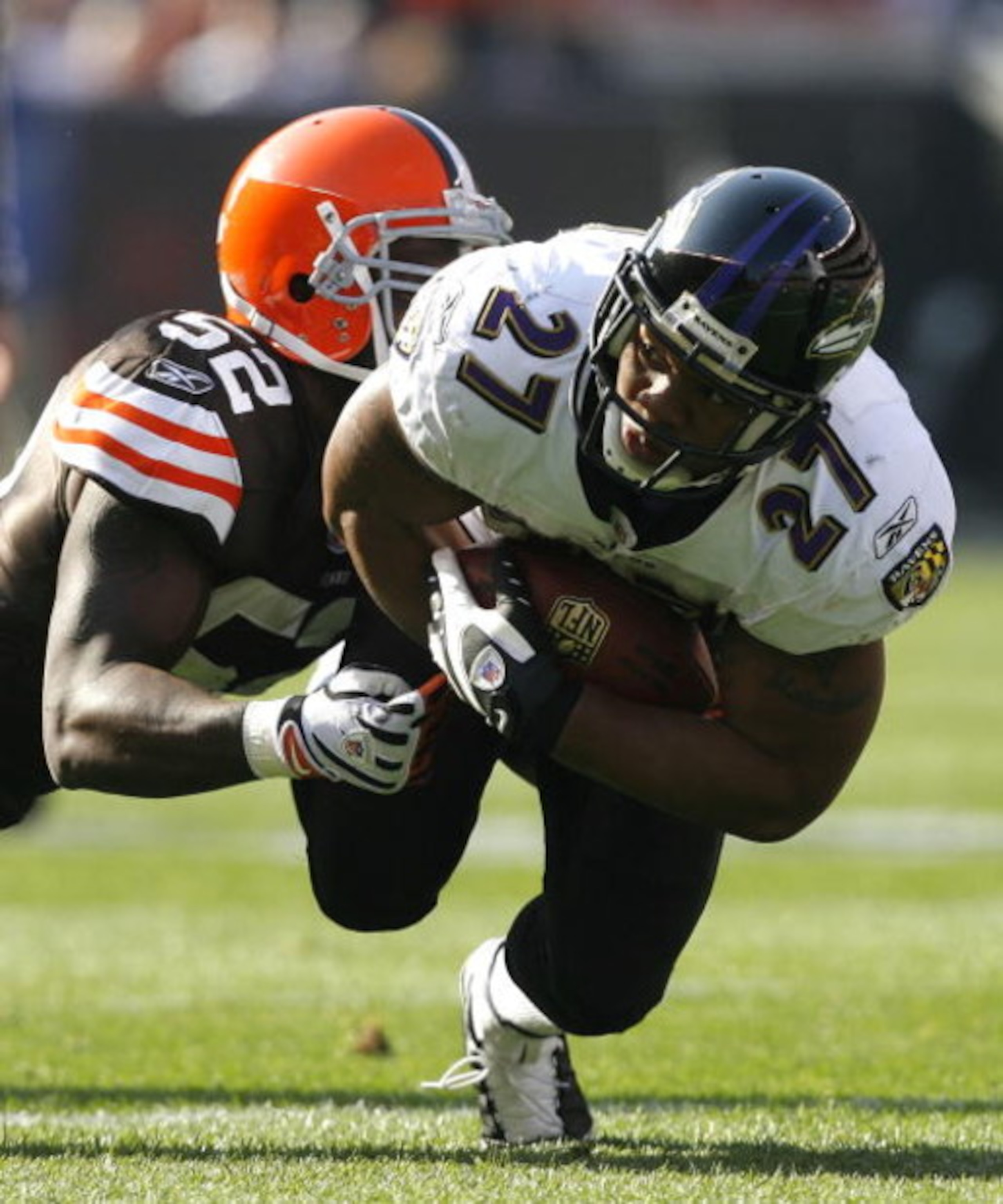 CLEVELAND - NOVEMBER 2:  Ray Rice #27 of the Baltimore Ravens runs the ball as he is hit by D'Qwell Jackson #52 of the Cleveland Browns during the second quarter of their NFL game at Cleveland Browns Stadium November 2, 2008 in Cleveland, Ohio.  (Photo by