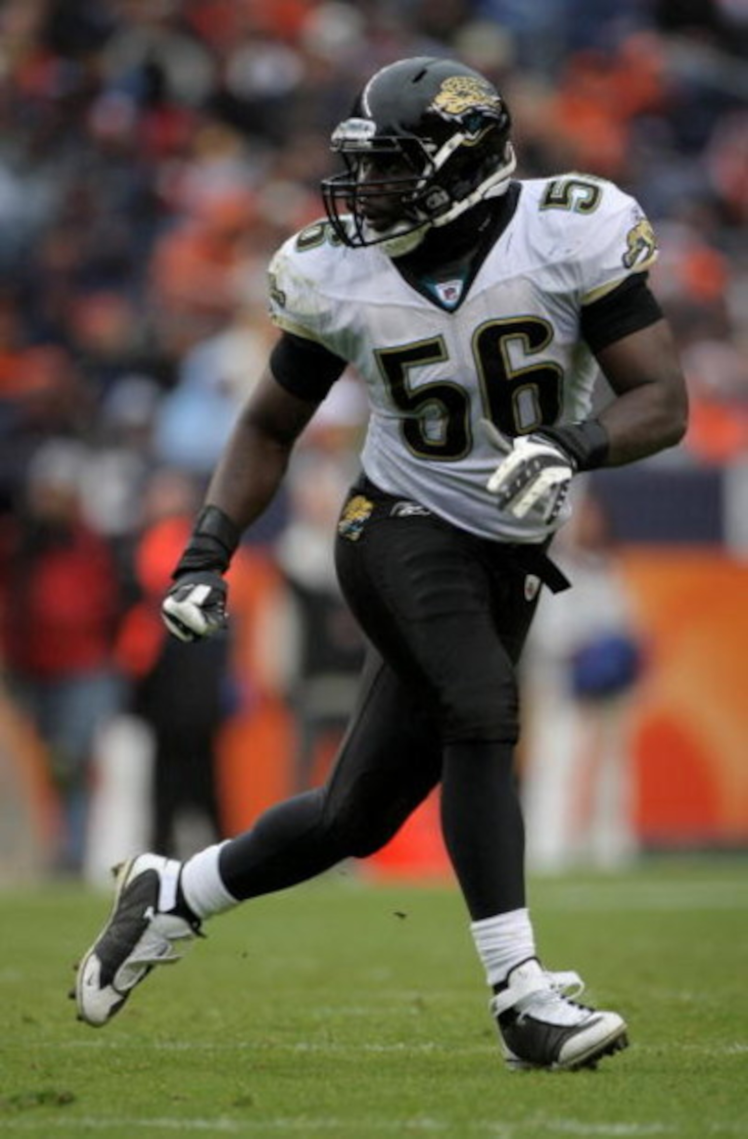 DENVER - OCTOBER 12:  Linebacker Justin Durant #56 of the Jacksonville Jaguars defends against the Denver Broncos during NFL action at Invesco Field at Mile High on October 12, 2008 in Denver, Colorado. The Jaguars defeated the Broncos 24-17.  (Photo by D