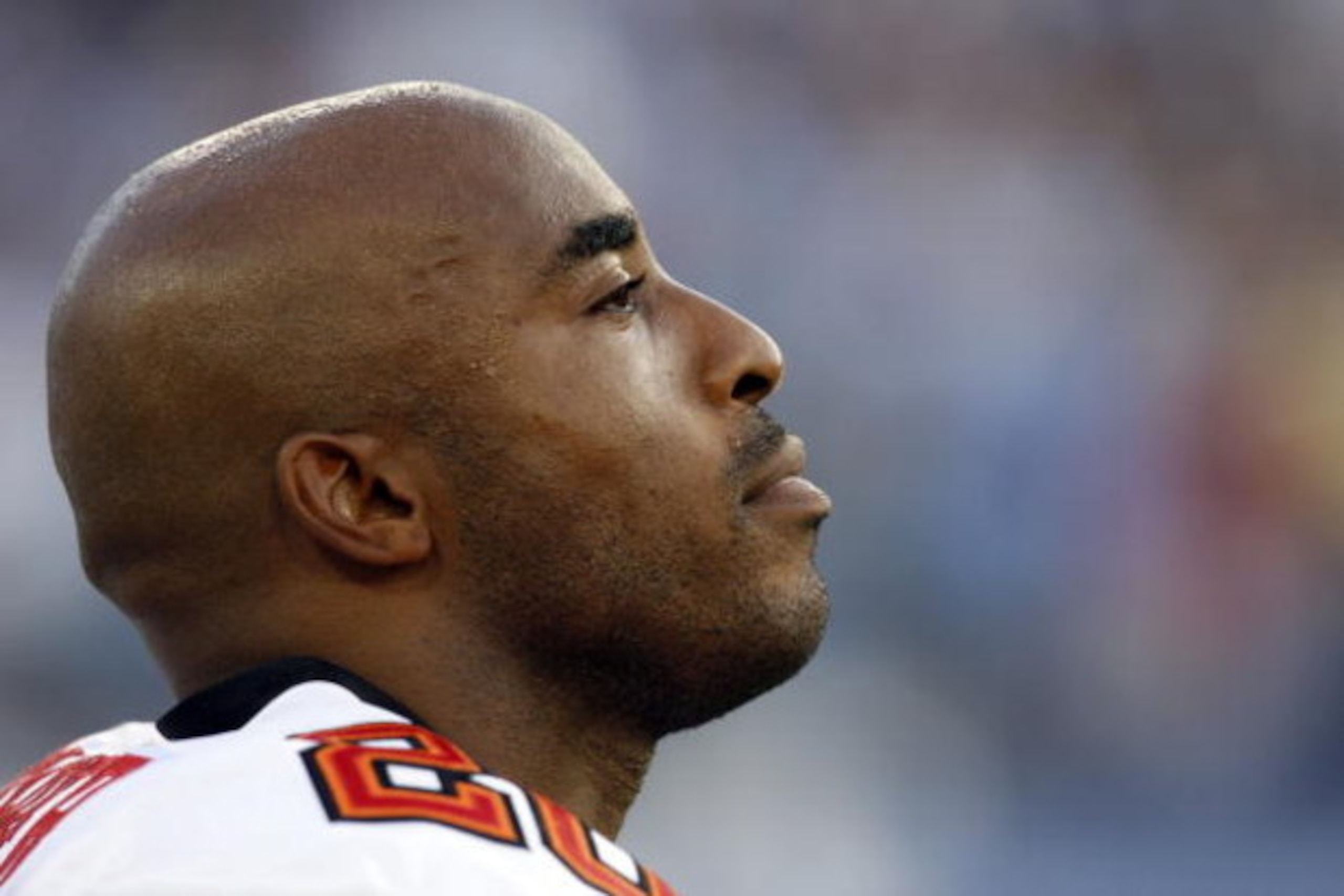 NASHVILLE, TN - AUGUST 15: Ronde Barber #20 of the Tampa Bay Buccaneers stands at attention during the national anthem against the Tennessee Titans during a preseason NFL game at LP Field on August 15, 2009 in Nashville, Tennessee. The Titans beat the Buc