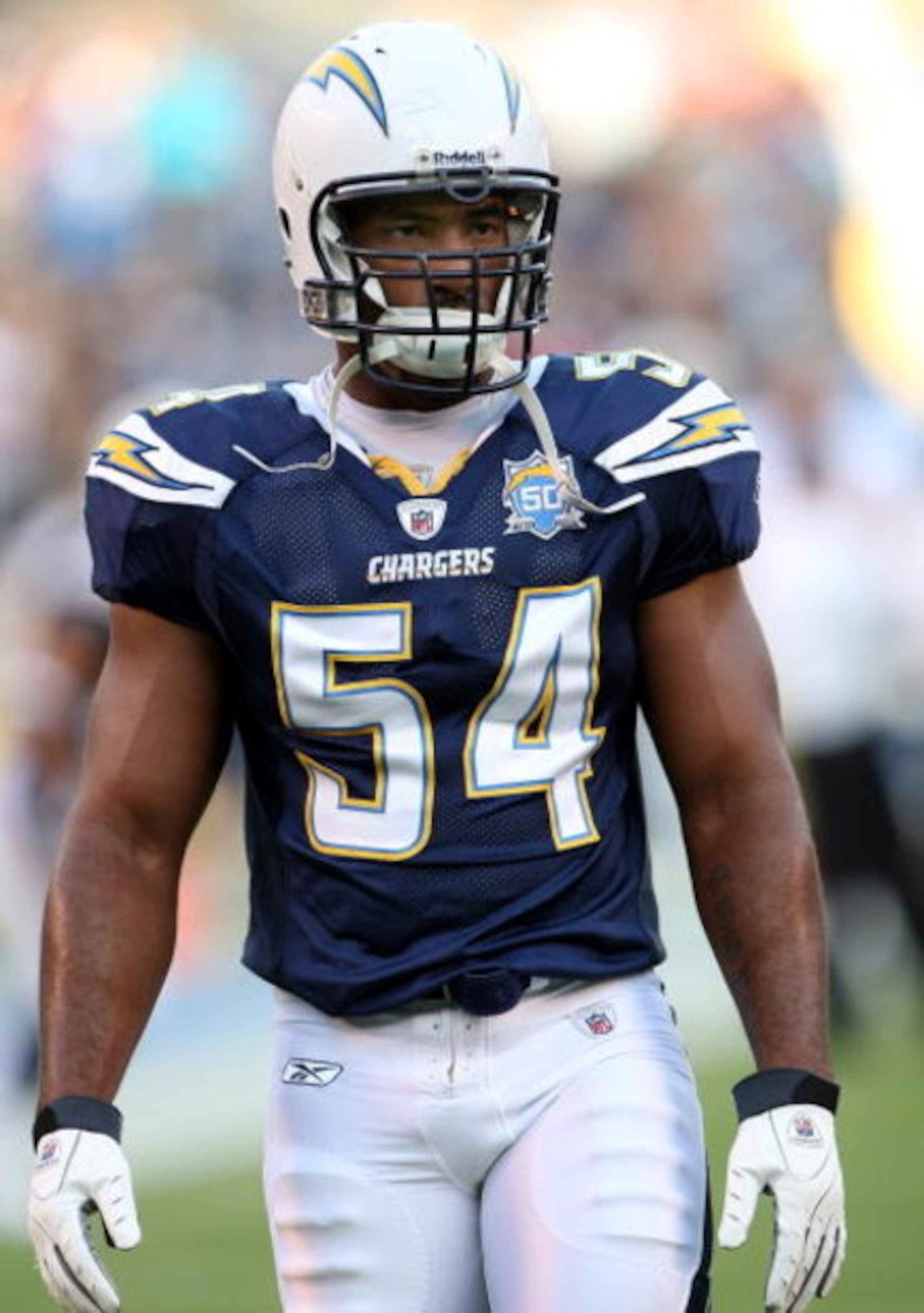 SAN DIEGO - SEPTEMBER 04:  Linebacker Stephen Cooper #54 of the San Diego Chargers warms up for the game with the San Francisco 49ers on September 4, 2009 at Qualcomm Stadium in San Diego, California.   The Chrgers won 26-7.  (Photo by Stephen Dunn/Getty 