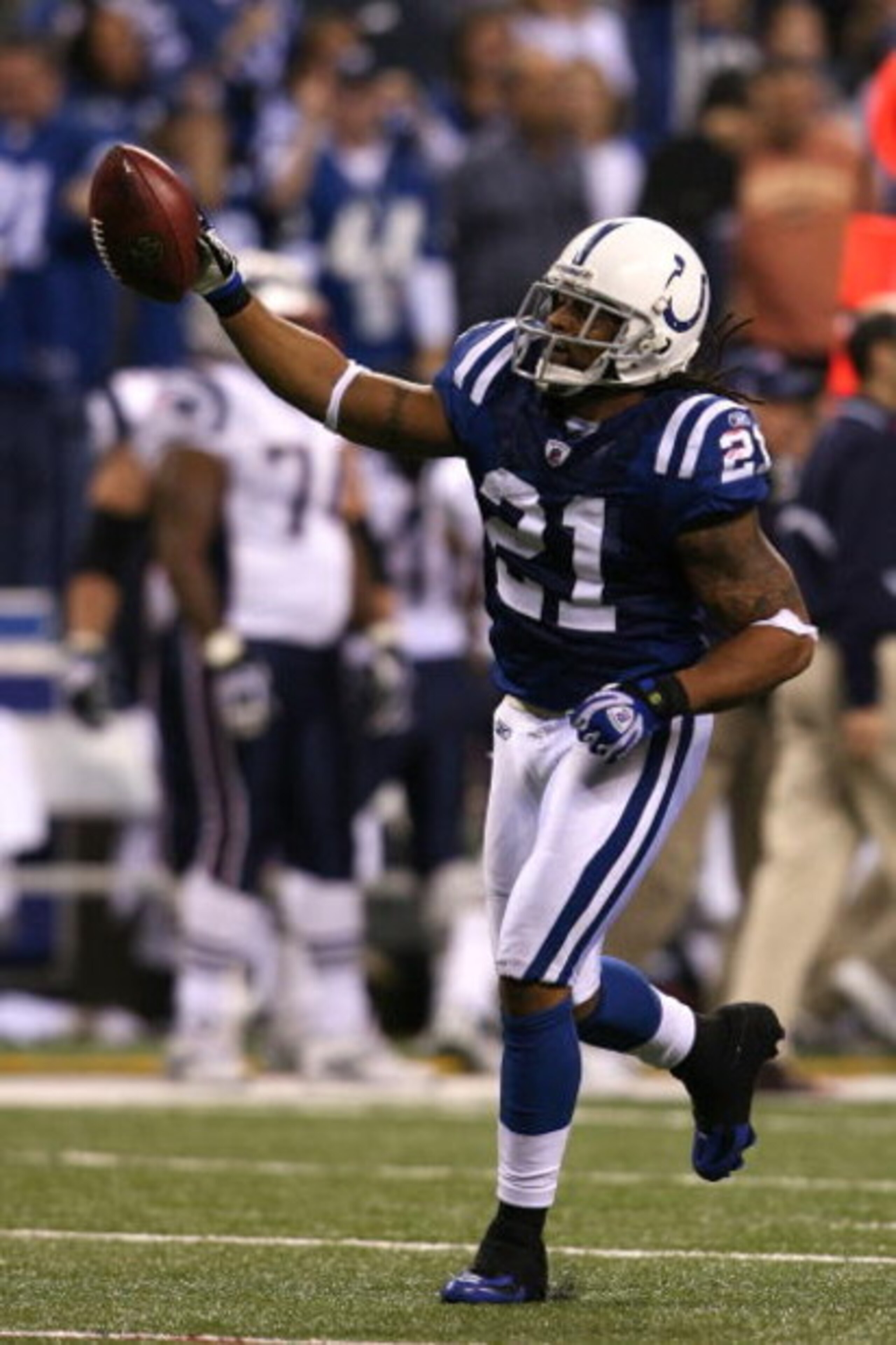 INDIANAPOLIS - NOVEMBER 02:  Bob Sanders #21 of the Indianapolis Colts celebrates after he intercepted  a pass in the fourth quarter against the New England Patriots at Lucas Oil Stadium on November 2, 2008 in Indianapolis, Indiana.  (Photo by Andy Lyons/