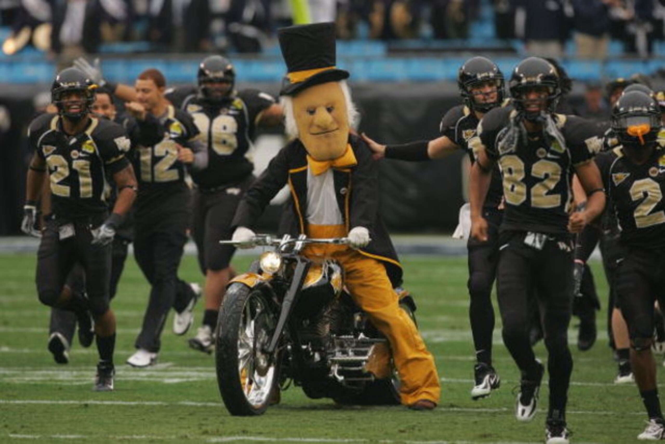 CHARLOTTE, NC - DECEMBER 29:  The mascot of the Wake Forest Demon Deacons rides a motorcycle onto the field to entertain the crowd during the game against the Connecticut Huskies at Bank of America Stadium on December 29, 2007 in Charlotte, North Carolina