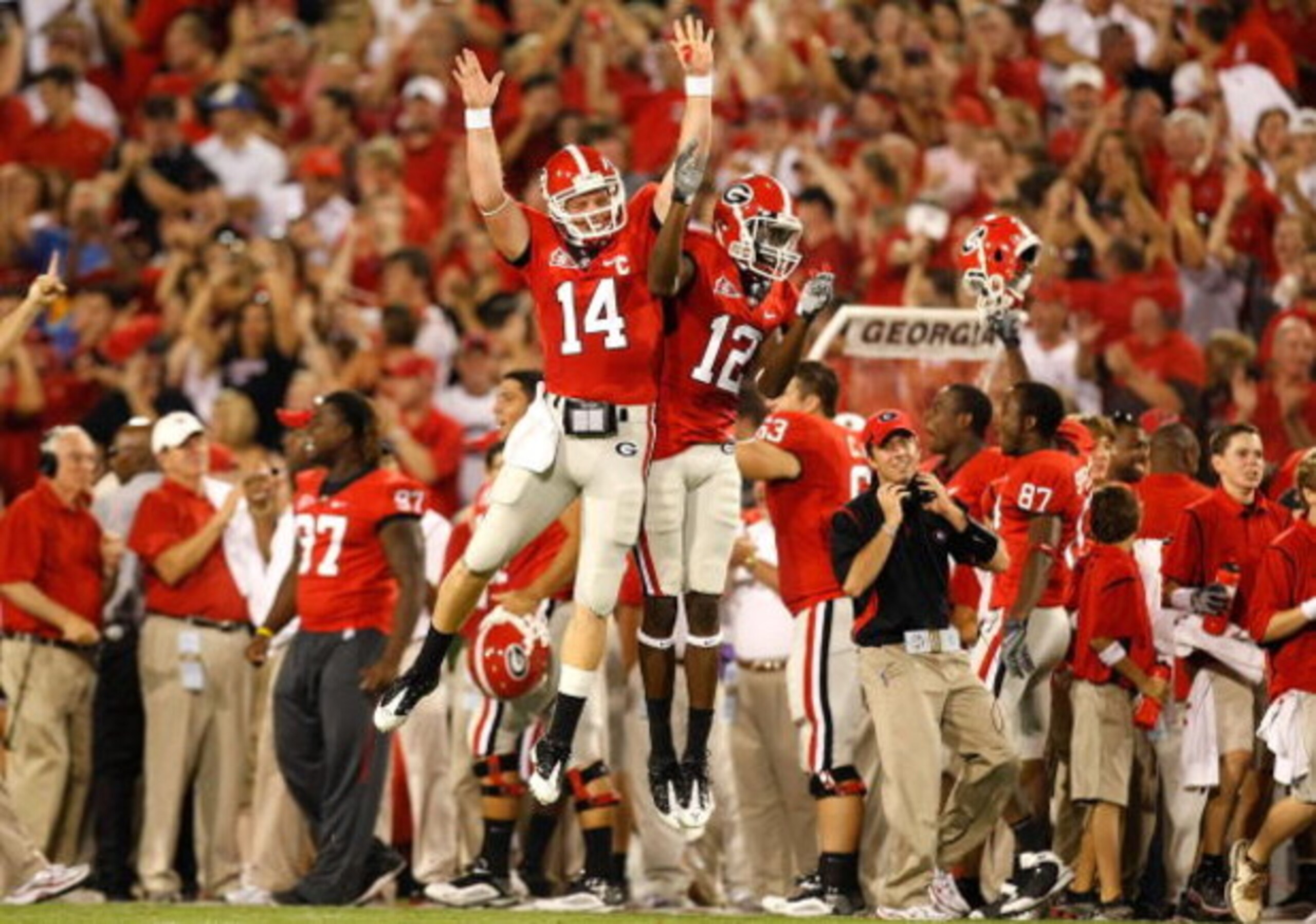 ATHENS, GA - SEPTEMBER 12:  Quarterback Joe Cox #14 and Tavarres King #12 celebrate a touchdown against the Georgia Bulldogs of the South Carolina Gamecocks at Sanford Stadium on September 12, 2009 in Athens, Georgia.  (Photo by Kevin C. Cox/Getty Images)