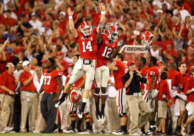 ATHENS, GA - SEPTEMBER 12:  Quarterback Joe Cox #14 and Tavarres King #12 celebrate a touchdown against the Georgia Bulldogs of the South Carolina Gamecocks at Sanford Stadium on September 12, 2009 in Athens, Georgia.  (Photo by Kevin C. Cox/Getty Images)