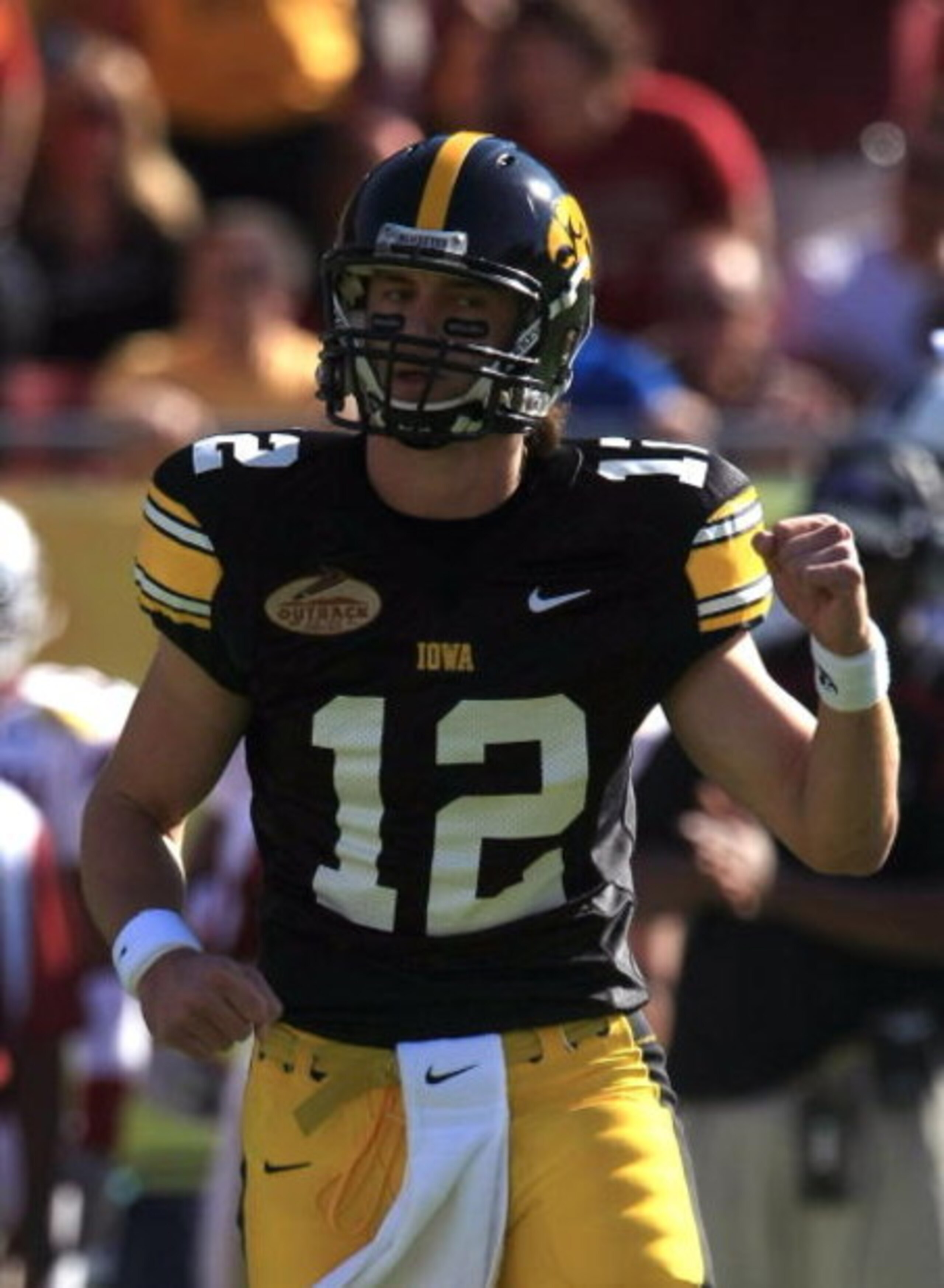 TAMPA, FL - JANUARY 01: Ricky Stanzi #12 of the Iowa Hawkeyes celebrates a touchdown pass against the South Carolina Gamecocks during the Outback Bowl on January 1, 2009 at Raymond James Stadium in Tampa, Florida. (Photo by Scott Halleran/Getty Images) TAMPA, FL - JANUARY 01: Ricky Stanzi #12 of the Iowa Hawkeyes celebrates a touchdown pass against the South Carolina Gamecocks during the Outback Bowl on January 1, 2009 at Raymond James Stadium in Tampa, Florida. (Photo by Scott Halleran/Getty Images)