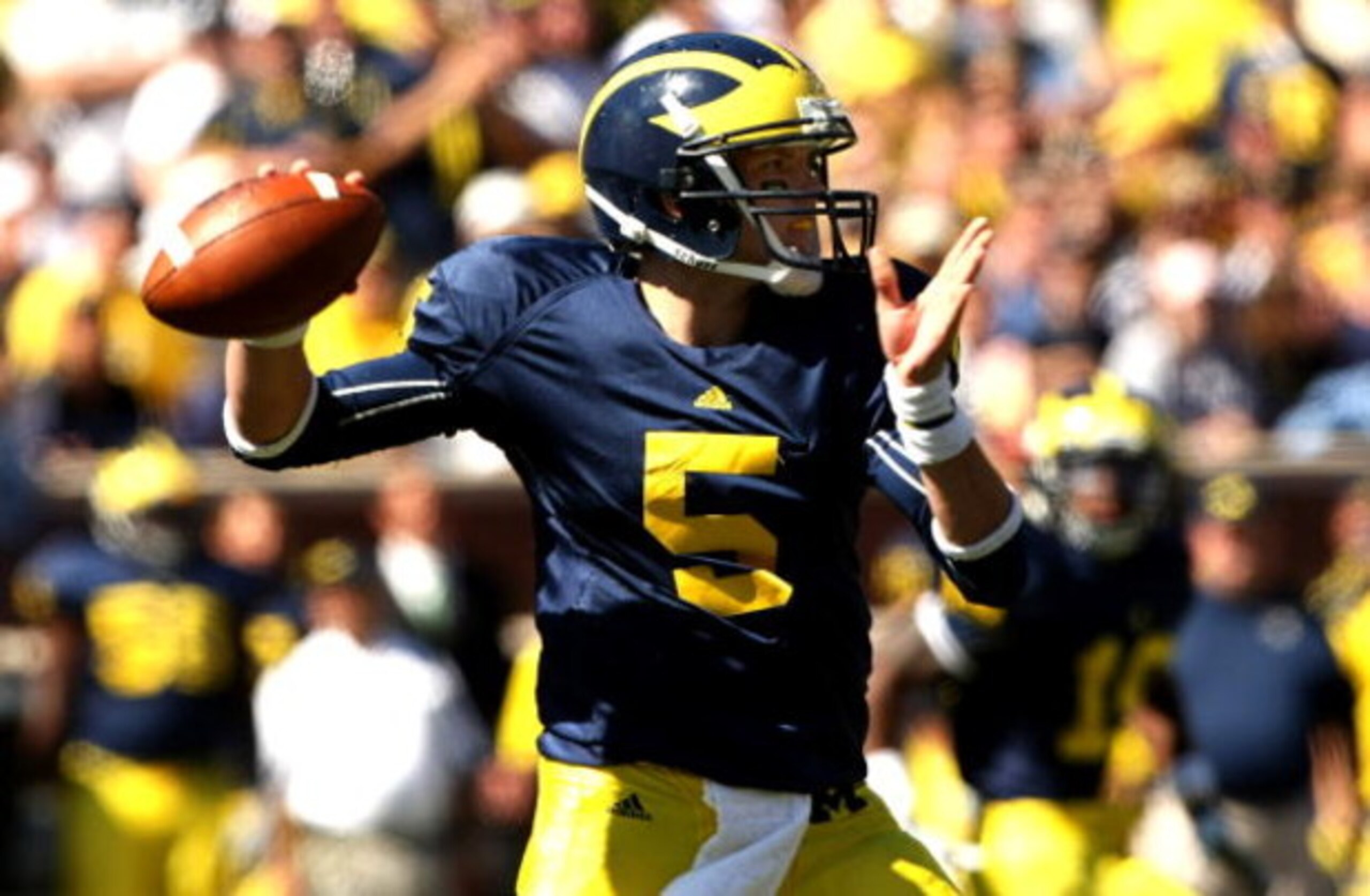 ANN ARBOR, MI - SEPTEMBER 19: Quarterback Tate Forcier #5 of the Michigan Wolverines throws a pass against the Eastern Michigan Eagles at Michigan Stadium on September 19, 2009 in Ann Arbor, Michigan. Michigan won 45-17. (Photo by Stephen Dunn/Getty I ANN ARBOR, MI - SEPTEMBER 19: Quarterback Tate Forcier #5 of the Michigan Wolverines throws a pass against the Eastern Michigan Eagles at Michigan Stadium on September 19, 2009 in Ann Arbor, Michigan. Michigan won 45-17. (Photo by Stephen Dunn/Getty I