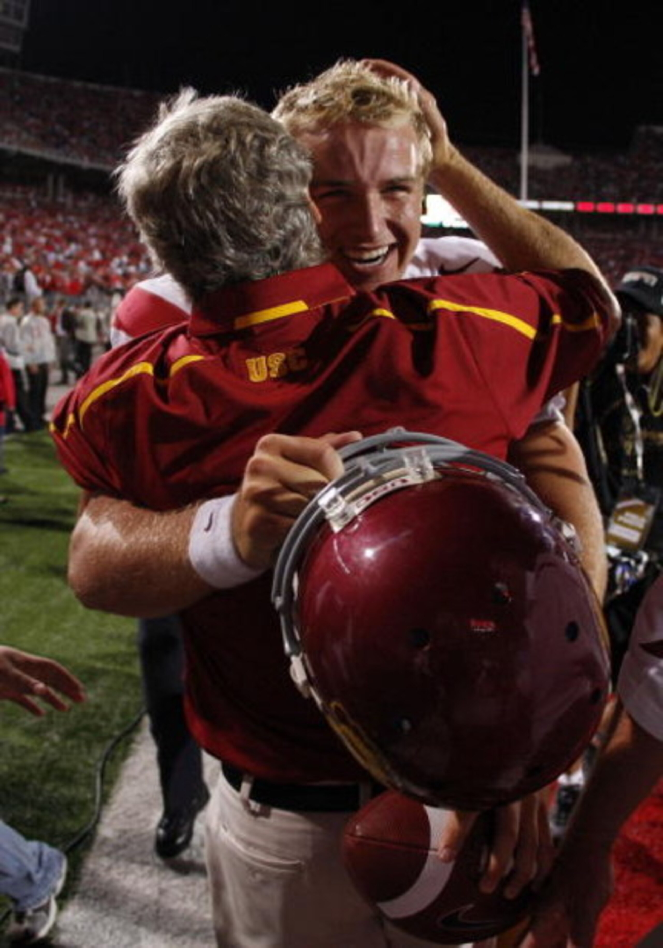 COLUMBUS, OH - SEPTEMBER 12: Head coach Pete Carroll hugs Matt Barkley #7 of the Southern California Trojans after defeating the Ohio State Buckeyes 18-15 on September 12, 2009 at Ohio Stadium in Columbus, Ohio. (Photo by Gregory Shamus/Getty Images) COLUMBUS, OH - SEPTEMBER 12: Head coach Pete Carroll hugs Matt Barkley #7 of the Southern California Trojans after defeating the Ohio State Buckeyes 18-15 on September 12, 2009 at Ohio Stadium in Columbus, Ohio. (Photo by Gregory Shamus/Getty Images)