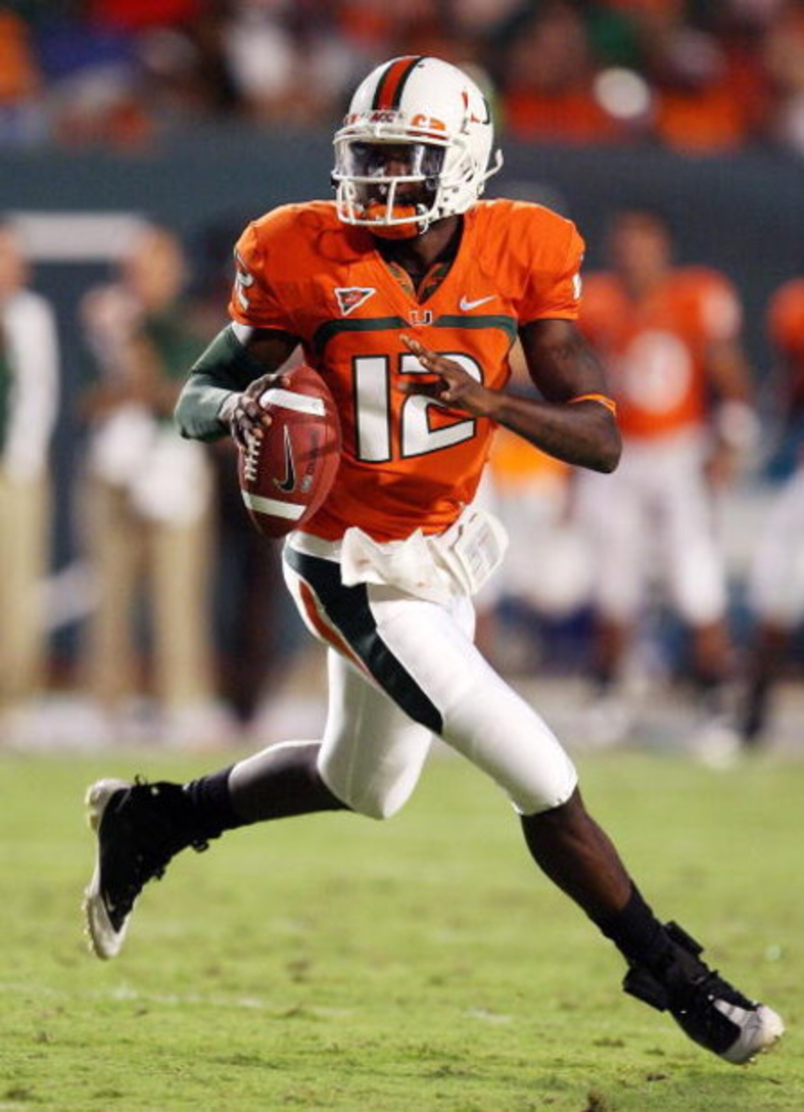 FORT LAUDERDALE, FL - SEPTEMBER 17: Quarterback Jacory Harris #12 of the Miami Hurricanes scrambles against the Georgia Tech Yellow Jackets at Land Shark Stadium on September 17, 2009 in Fort Lauderdale, Florida. (Photo by Doug Benc/Getty Images) FORT LAUDERDALE, FL - SEPTEMBER 17: Quarterback Jacory Harris #12 of the Miami Hurricanes scrambles against the Georgia Tech Yellow Jackets at Land Shark Stadium on September 17, 2009 in Fort Lauderdale, Florida. (Photo by Doug Benc/Getty Images)