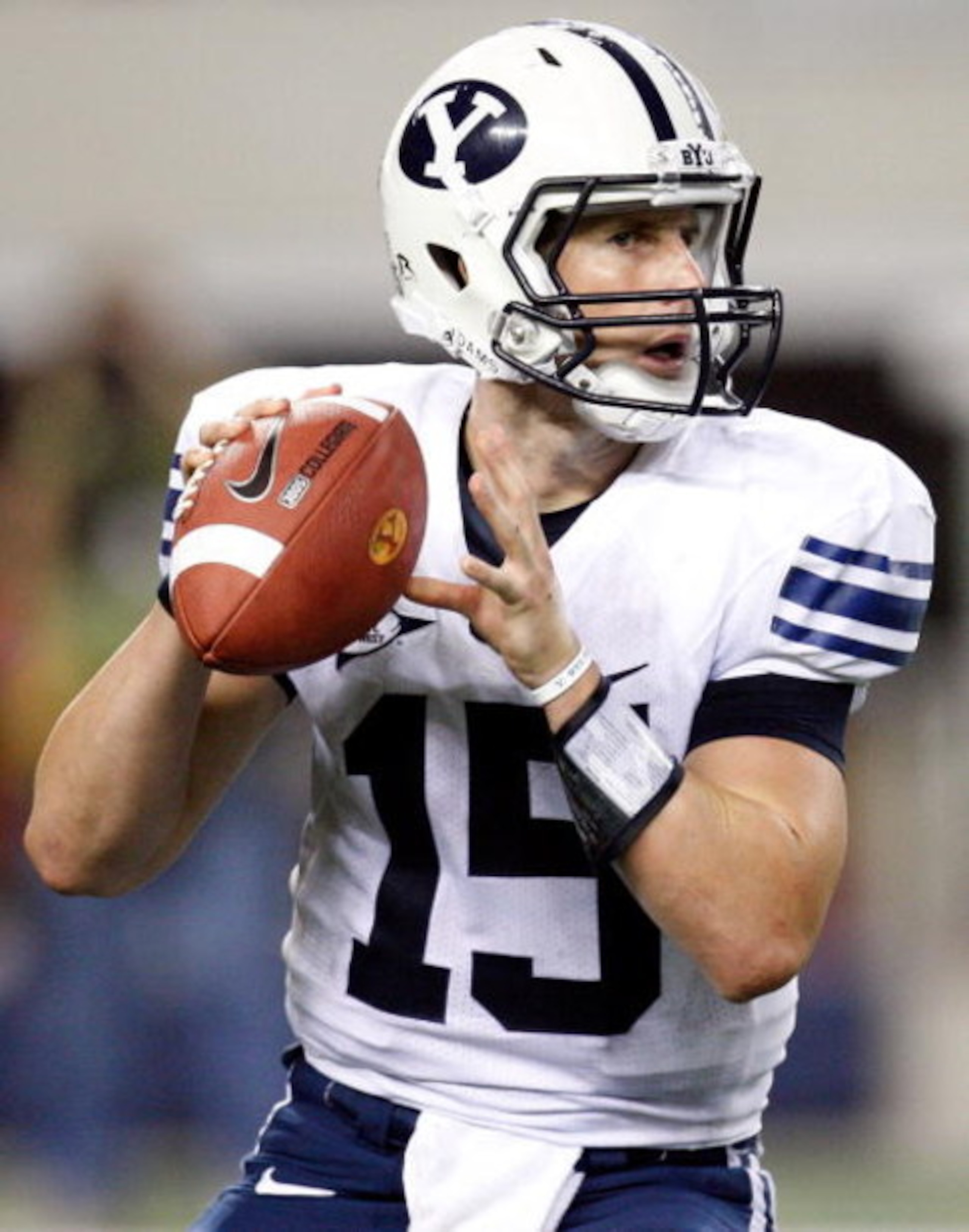 ARLINGTON, TX - SEPTEMBER 05: Quarterback Max Hall #15 of the Brigham Young Cougars drops back to pass against the Oklahoma Sooners at Cowboys Stadium on September 5, 2009 in Arlington, Texas. (Photo by Ronald Martinez/Getty Images) ARLINGTON, TX - SEPTEMBER 05: Quarterback Max Hall #15 of the Brigham Young Cougars drops back to pass against the Oklahoma Sooners at Cowboys Stadium on September 5, 2009 in Arlington, Texas. (Photo by Ronald Martinez/Getty Images)