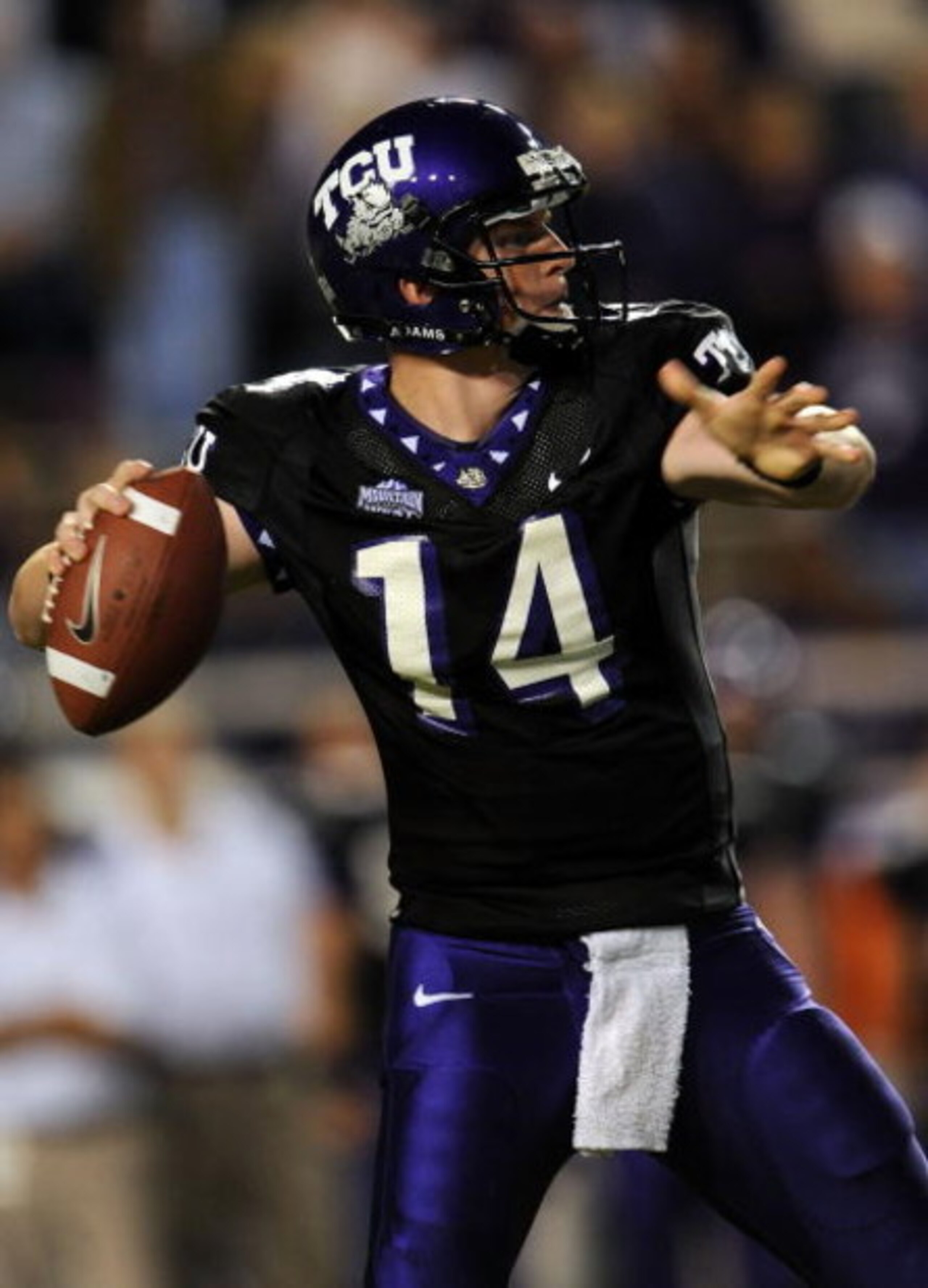 FORT WORTH, TX - OCTOBER 16: Quarterback Andy Dalton #14 of the TCU Horned Frogs drops back to pass against the BYU Cougars in the first quarter at Amon G. Carter Stadium on October 16, 2008 in Fort Worth, Texas. (Photo by Ronald Martinez/Getty Images) FORT WORTH, TX - OCTOBER 16: Quarterback Andy Dalton #14 of the TCU Horned Frogs drops back to pass against the BYU Cougars in the first quarter at Amon G. Carter Stadium on October 16, 2008 in Fort Worth, Texas. (Photo by Ronald Martinez/Getty Images)