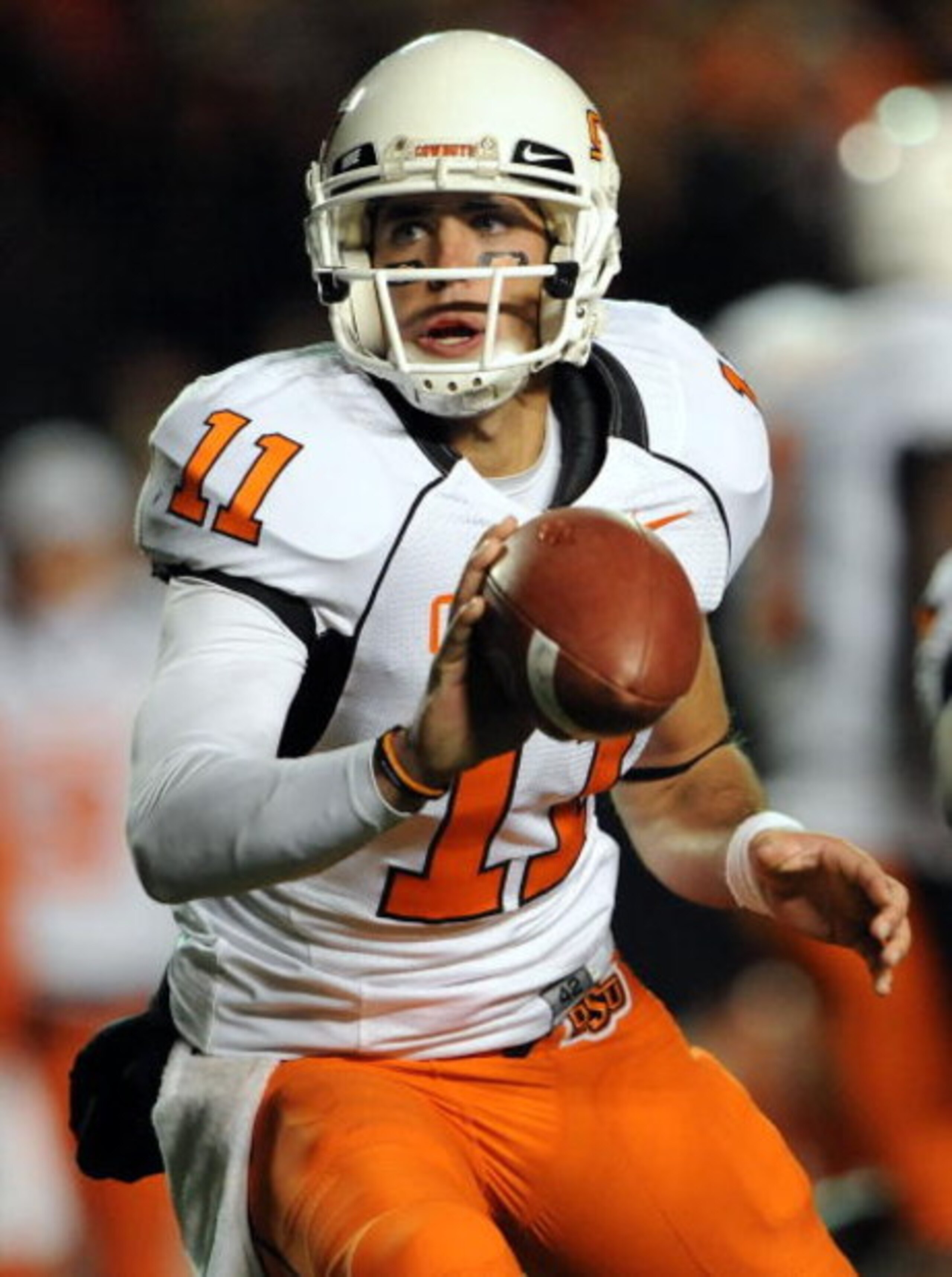 LUBBOCK, TX - NOVEMBER 08: Quarterback Zac Robinson #11 of the Oklahoma State Cowboys during play against the Texas Tech Red Raiders at Jones AT&T Stadium on November 8, 2008 in Lubbock, Texas. (Photo by Ronald Martinez/Getty Images) LUBBOCK, TX - NOVEMBER 08: Quarterback Zac Robinson #11 of the Oklahoma State Cowboys during play against the Texas Tech Red Raiders at Jones AT&T Stadium on November 8, 2008 in Lubbock, Texas. (Photo by Ronald Martinez/Getty Images)