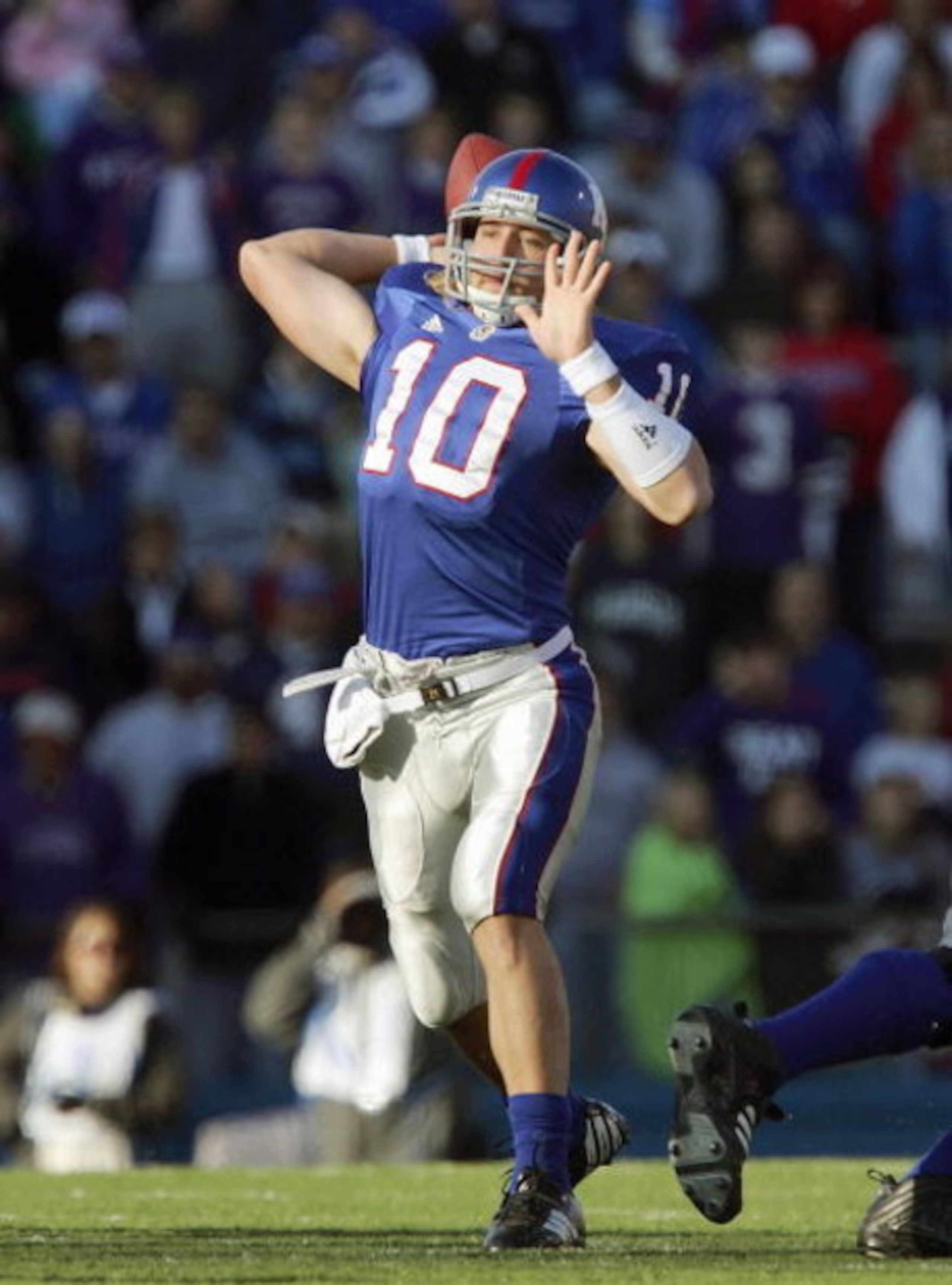 LAWRENCE, KS - NOVEMBER 18: Quaterback Kerry Meier #10 of the Kansas Jayhawks passes the ball during the game against the Kansas State Wildcats at Memorial Stadium on November 18, 2006 in Lawrence, Kansas. The Kansas Jayhawks won 39-20. (Photo by Brian Ba LAWRENCE, KS - NOVEMBER 18: Quaterback Kerry Meier #10 of the Kansas Jayhawks passes the ball during the game against the Kansas State Wildcats at Memorial Stadium on November 18, 2006 in Lawrence, Kansas. The Kansas Jayhawks won 39-20. (Photo by Brian Ba