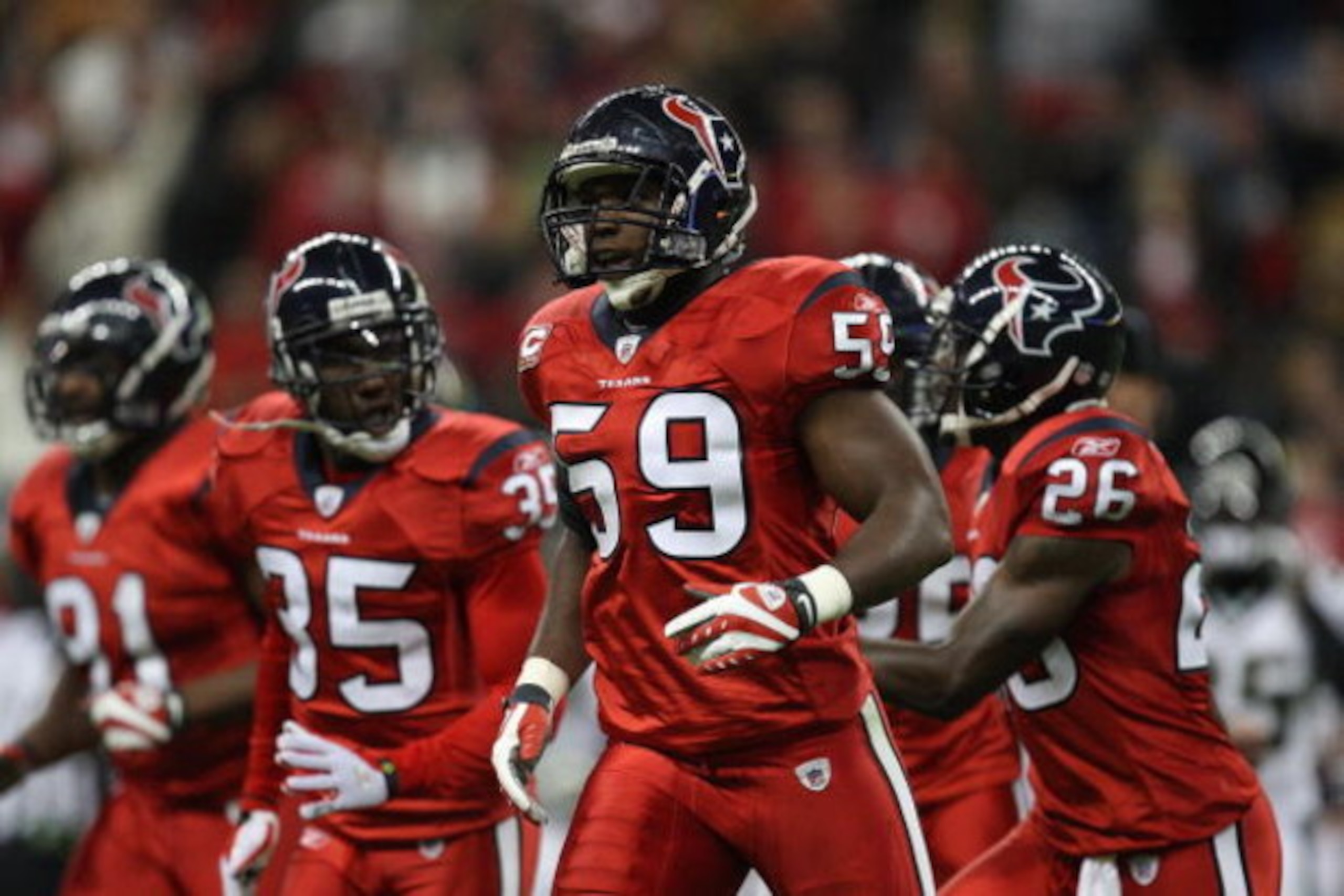 HOUSTON - DECEMBER 01:  DeMeco Ryans #59 of the Houston Texans during play against the Jacksonville Jaguars at Reliant Stadium on December 1, 2008 in Houston, Texas.  (Photo by Ronald Martinez/Getty Images)