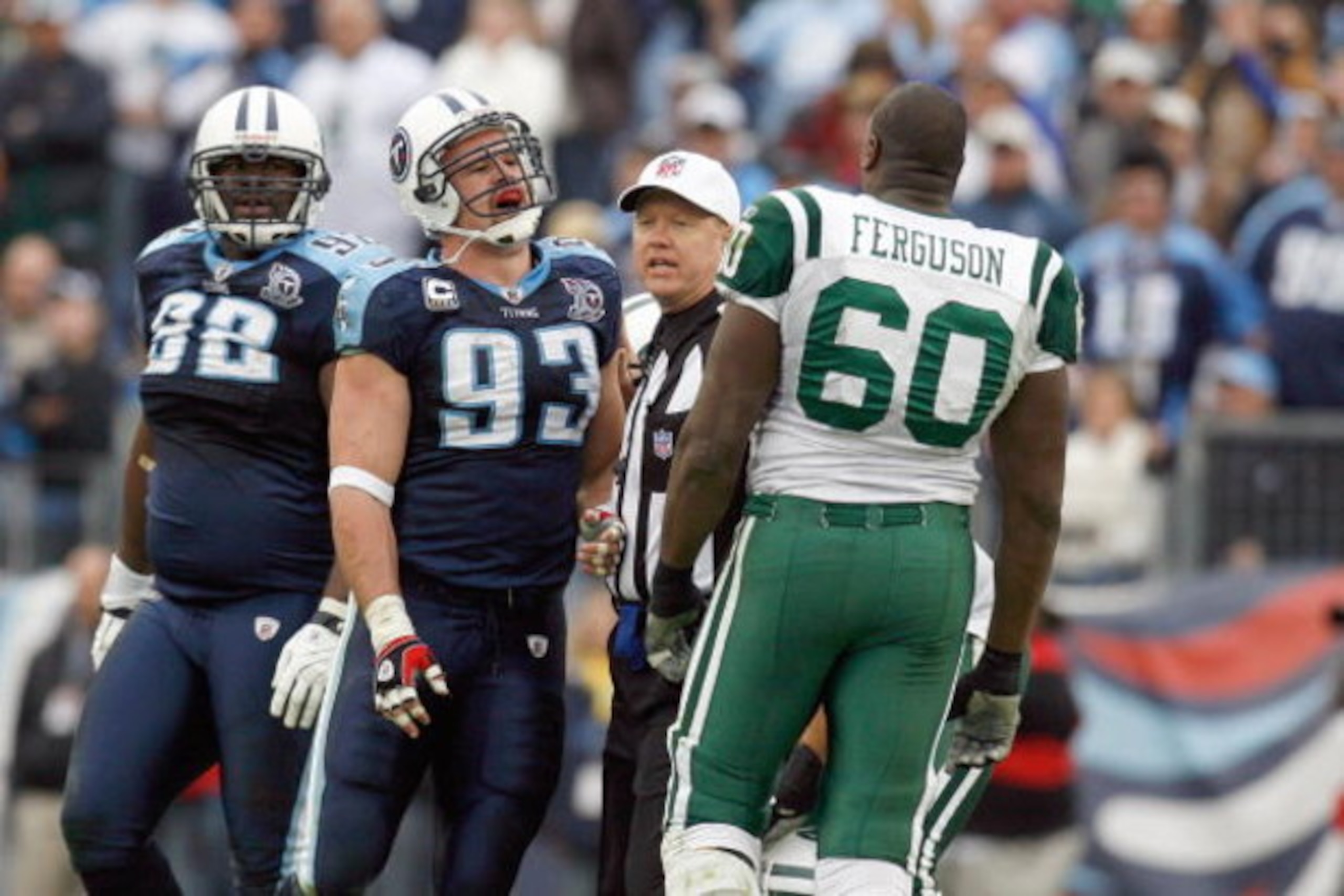NASHVILLE, TN - NOVEMBER 23:  Kyle Vanden Bosch #93 of the Tennessee Titans confronts D'Brickashaw Ferguson #60 of the New York Jets at LP Field on November 23, 2008 in Nashville, Tennessee. (Photo by Kevin C. Cox/Getty Images)