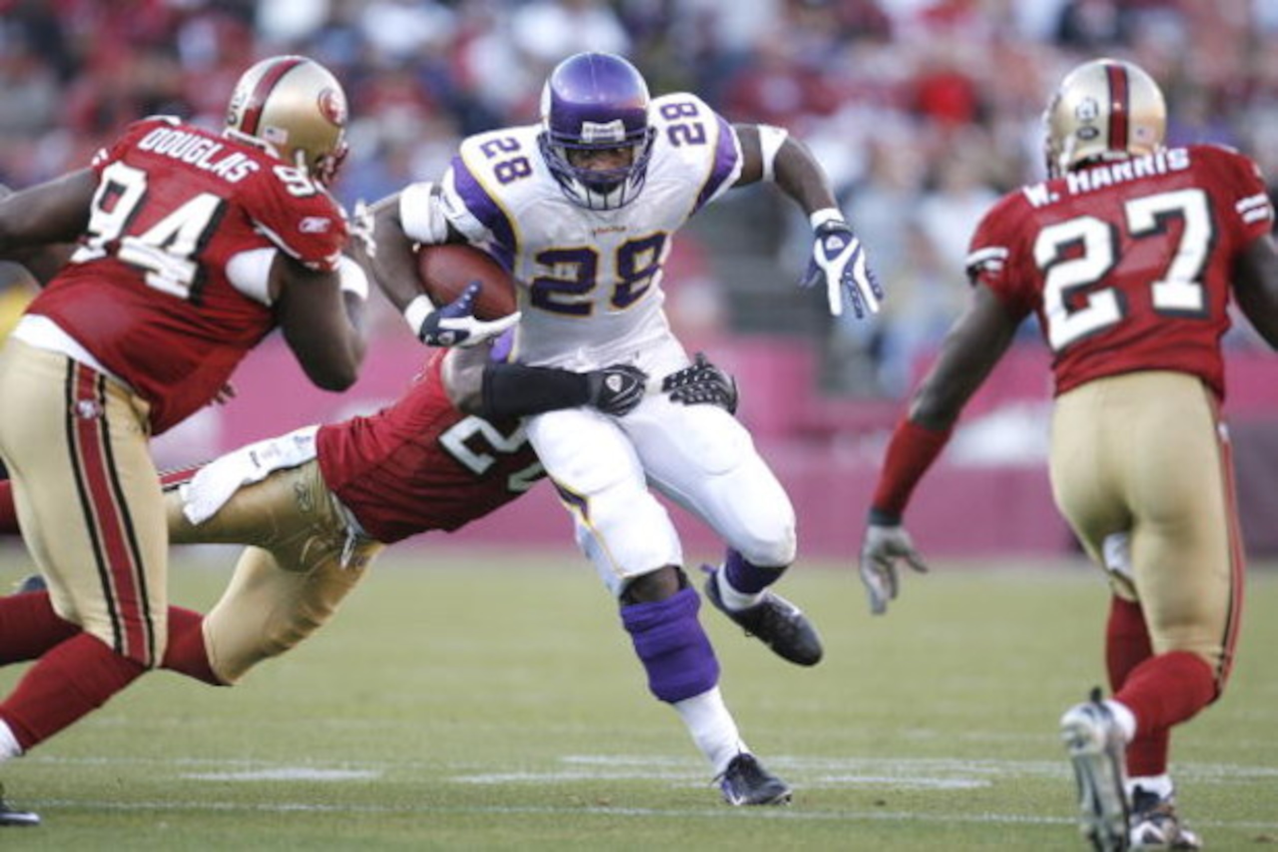 SAN FRANCISCO - DECEMBER 9:  Running back Adrian Peterson #28 of the Minnesota Vikings looks for room as run for only three yards during a game against the San Francisco 49ers on December 9, 2007 at Monster Park in San Francisco, California.  (Photo by Gr