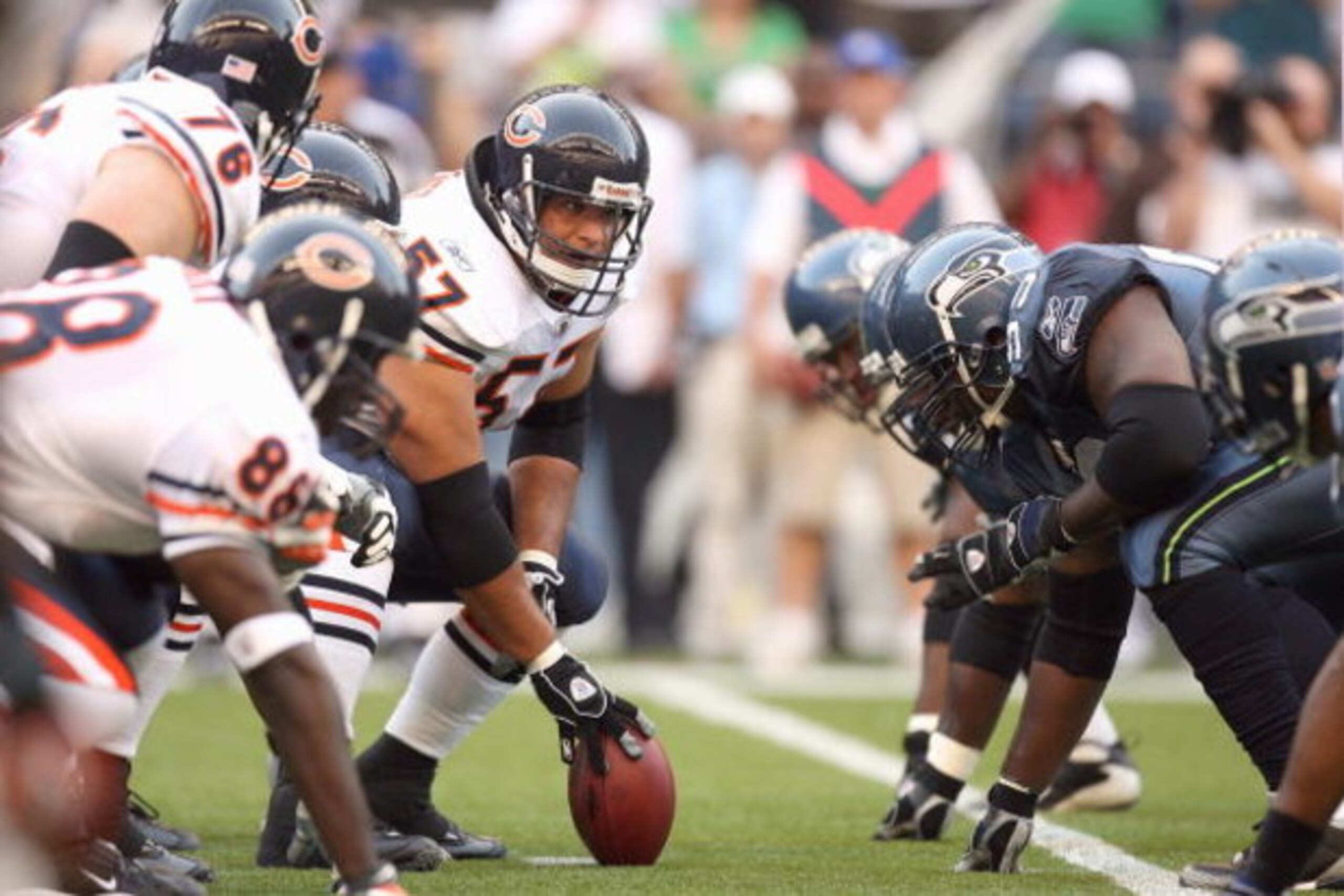 SEATTLE - AUGUST 16:  Center Olin Kreutz #57 of the Chicago Bears gets ready to hike the ball during the game against the Seattle Seahawks at Qwest Field on August 16, 2008 in Seattle, Washington. The Seahawks defeated the Bears 29-26. (Photo by Otto Greu