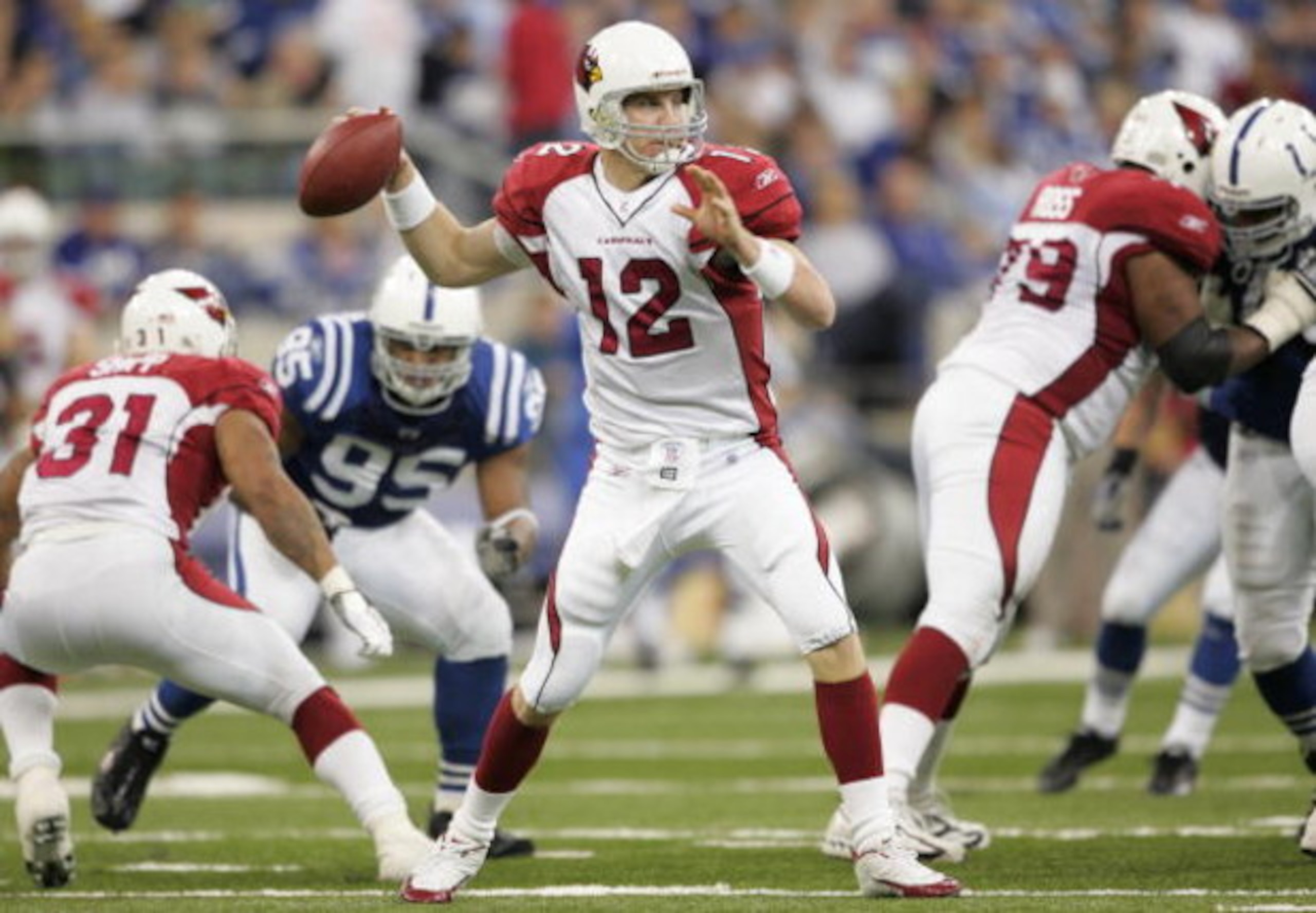 INDIANAPOLIS - JANUARY 01:  Josh McCown #12 of the Arizona Cardinals throws a pass against the Indianapolis Colts during the NFL game on January 1, 2006 at the RCA Dome in Indianapolis, Indiana. The Colts won 17-13.  (Photo by Andy Lyons/Getty Images)