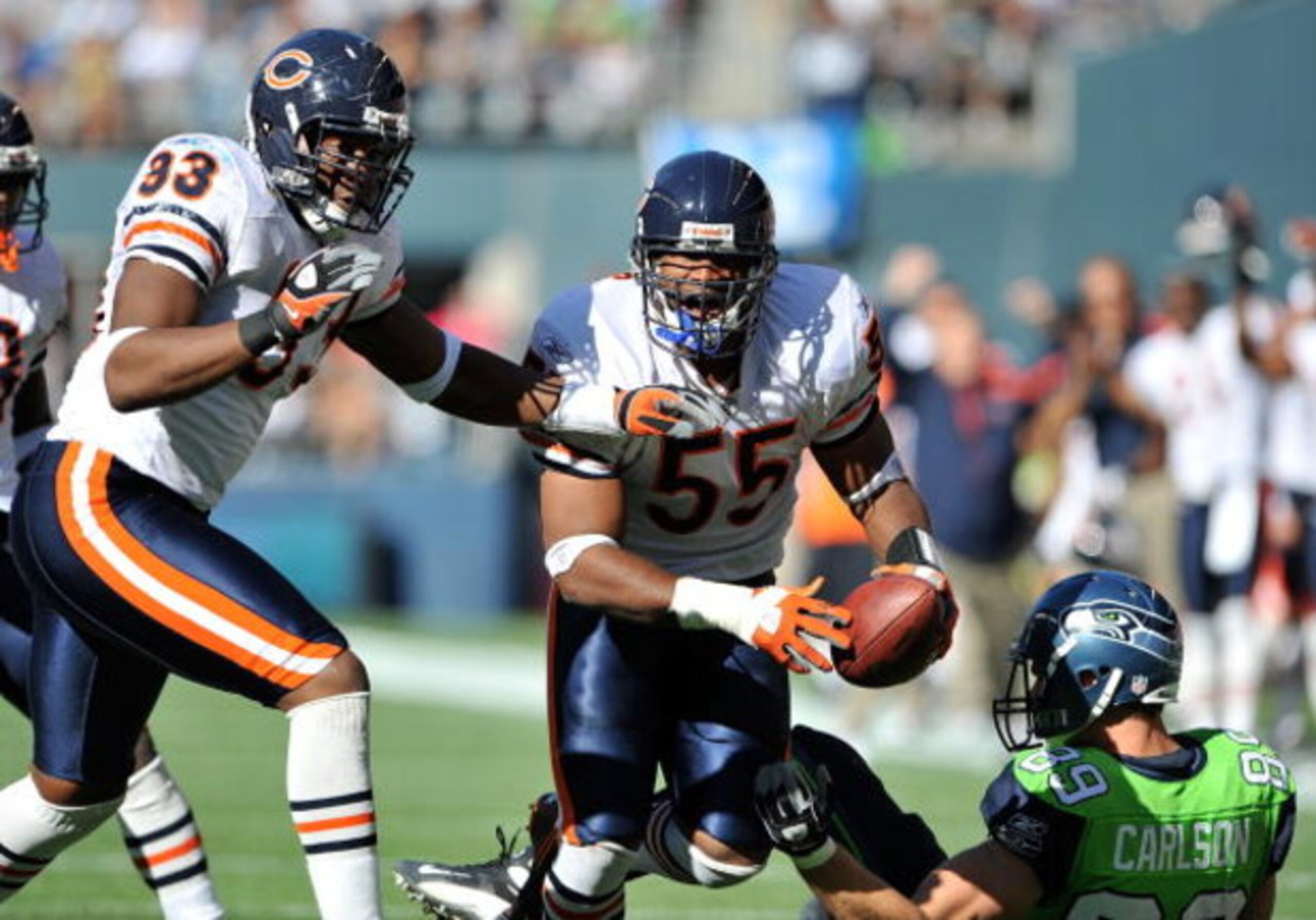 SEATTLE - SEPTEMBER 27: Linebacker Lance Briggs #55 of the Chicago Bears and defensive end Adewale Ogunleye #93 celebrate after Briggs made an interception against John Carlson #89 of the Seattle Seahawks on September 27, 2009 at Qwest Field in Seattle, SEATTLE - SEPTEMBER 27: Linebacker Lance Briggs #55 of the Chicago Bears and defensive end Adewale Ogunleye #93 celebrate after Briggs made an interception against John Carlson #89 of the Seattle Seahawks on September 27, 2009 at Qwest Field in Seattle,
