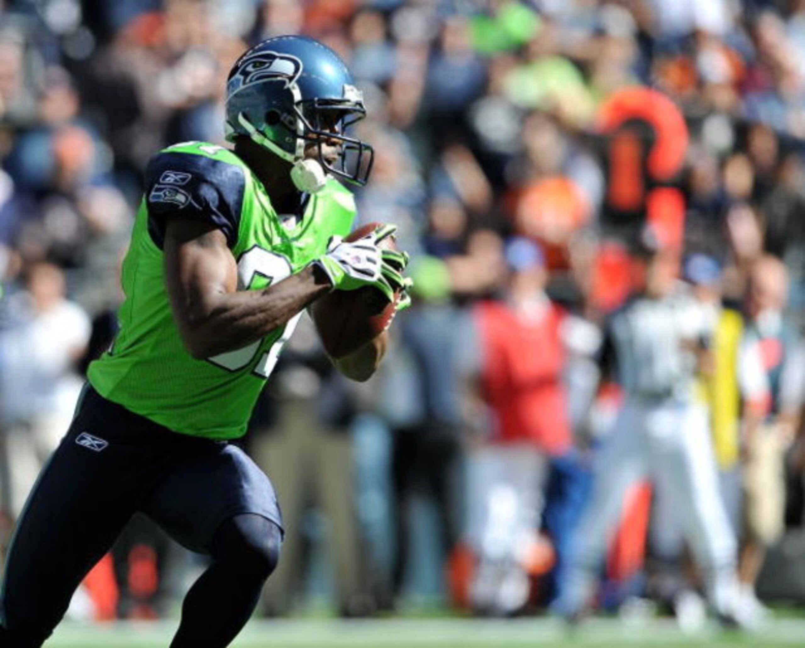 SEATTLE - SEPTEMBER 27: Wide receiver Nate Burleson #81 of the Seattle Seahawks rushes against the Chicago Bears on September 27, 2009 at Qwest Field in Seattle, Washington. The Bears defeated the Seahawks 25-19. (Photo by Otto Greule Jr/Getty Images) SEATTLE - SEPTEMBER 27: Wide receiver Nate Burleson #81 of the Seattle Seahawks rushes against the Chicago Bears on September 27, 2009 at Qwest Field in Seattle, Washington. The Bears defeated the Seahawks 25-19. (Photo by Otto Greule Jr/Getty Images)
