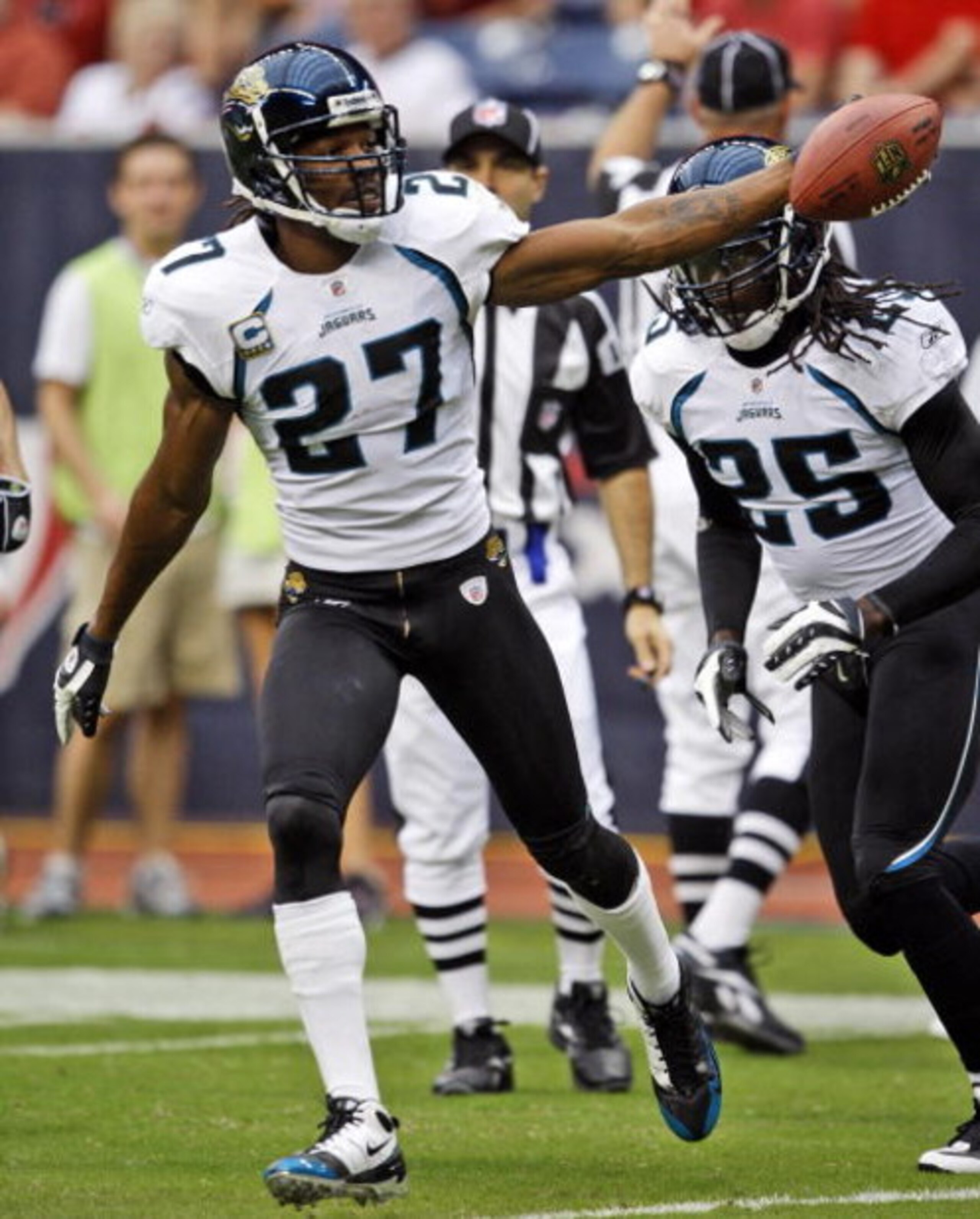 HOUSTON - SEPTEMBER 27: Cornerback Rasheem Mathis #27 of the Jacksonville Jaguars celebrates with safety Reggie Nelson after intercepting a pass meant for wide receiver Andre Johnson #80 of the Houston Texans at Reliant Stadium on September 27, 2009 in HOUSTON - SEPTEMBER 27: Cornerback Rasheem Mathis #27 of the Jacksonville Jaguars celebrates with safety Reggie Nelson after intercepting a pass meant for wide receiver Andre Johnson #80 of the Houston Texans at Reliant Stadium on September 27, 2009 in