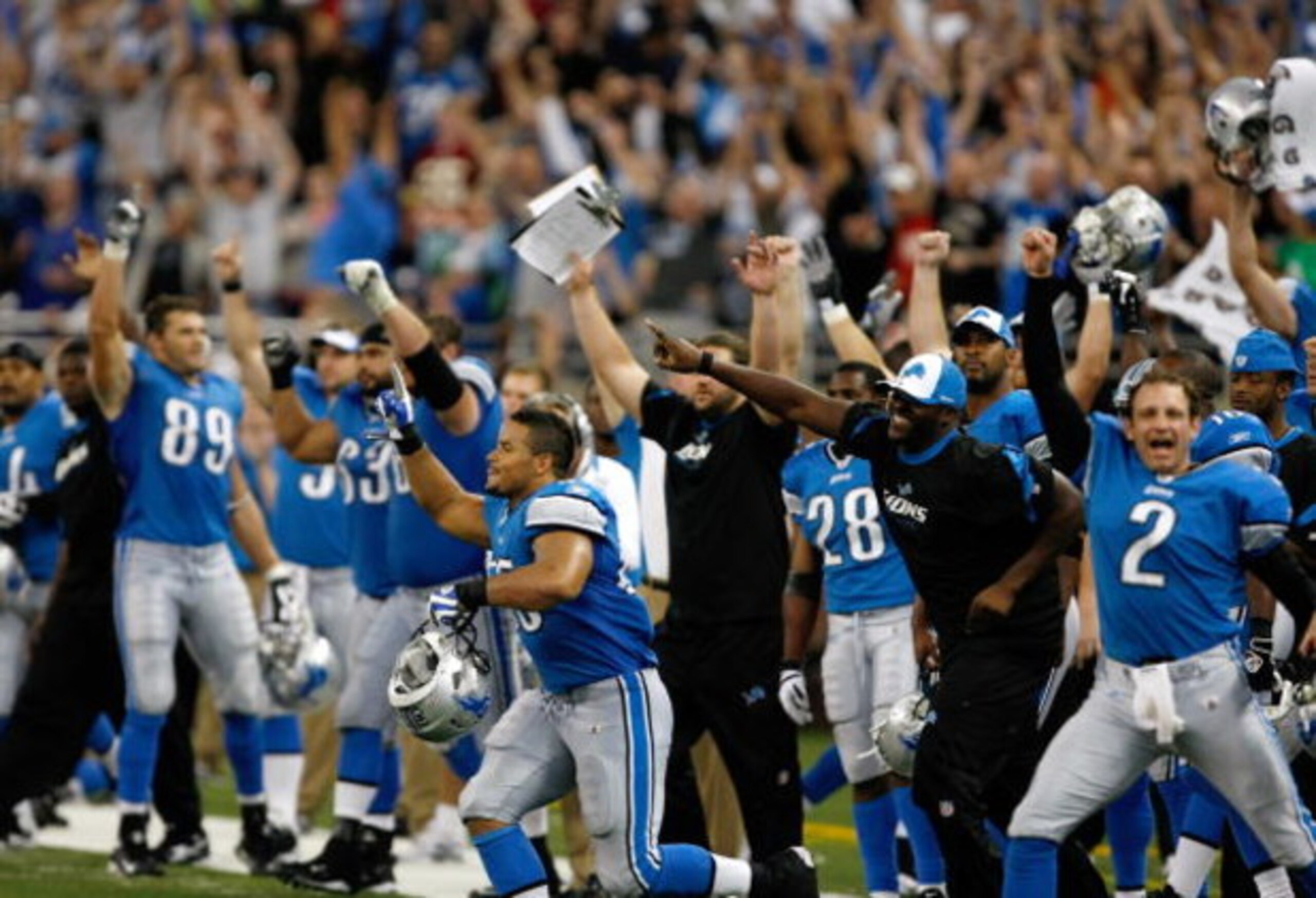 DETROIT, MI - SEPTEMBER 27: Detroit Lions players celebrate the victory as they run on the field after the victory against the Washington Redsklns at Ford Field on September 27, 2009 in Detroit, Michigan. The Lions defeated the Redskins 19-14. (Photo by S DETROIT, MI - SEPTEMBER 27: Detroit Lions players celebrate the victory as they run on the field after the victory against the Washington Redsklns at Ford Field on September 27, 2009 in Detroit, Michigan. The Lions defeated the Redskins 19-14. (Photo by S