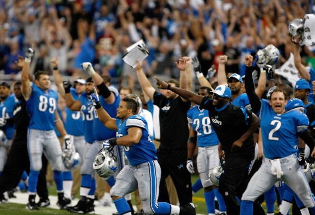 DETROIT, MI - SEPTEMBER 27: Detroit Lions players celebrate the victory as they run on the field after the victory against the Washington Redsklns at Ford Field on September 27, 2009 in Detroit, Michigan. The Lions defeated the Redskins 19-14. (Photo by S