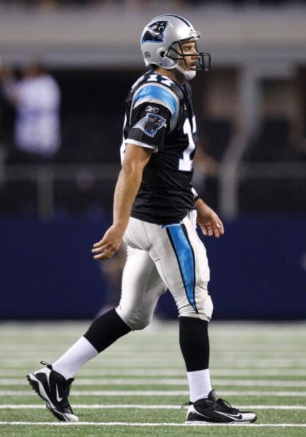 ARLINGTON, TX - SEPTEMBER 28:  Jake Delhomme #17 of the Carolina Panthers walks off the field after a play against the Dallas Cowboys at Cowboys Stadium on September 28, 2009 in Arlington, Texas. (Photo by Ronald Martinez/Getty Images)