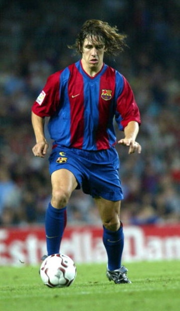 BARCELONA, SPAIN - SEPTEMBER 1:   Carlos Puyol of Barcelona in action during the Primera Liga match between Barcelona and Atletico Madrid, played at the Camp Nou Stadium, Barcelona, Spain on September 1, 2002.  (Photo Firo Foto/Getty Images) 