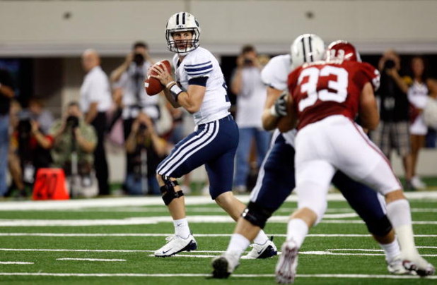ARLINGTON, TX - SEPTEMBER 05:  Quarterback Max Hall #15 of the Brigham Young Cougars drops back to pass against the Oklahoma Sooners at Cowboys Stadium on September 5, 2009 in Arlington, Texas.  (Photo by Ronald Martinez/Getty Images)