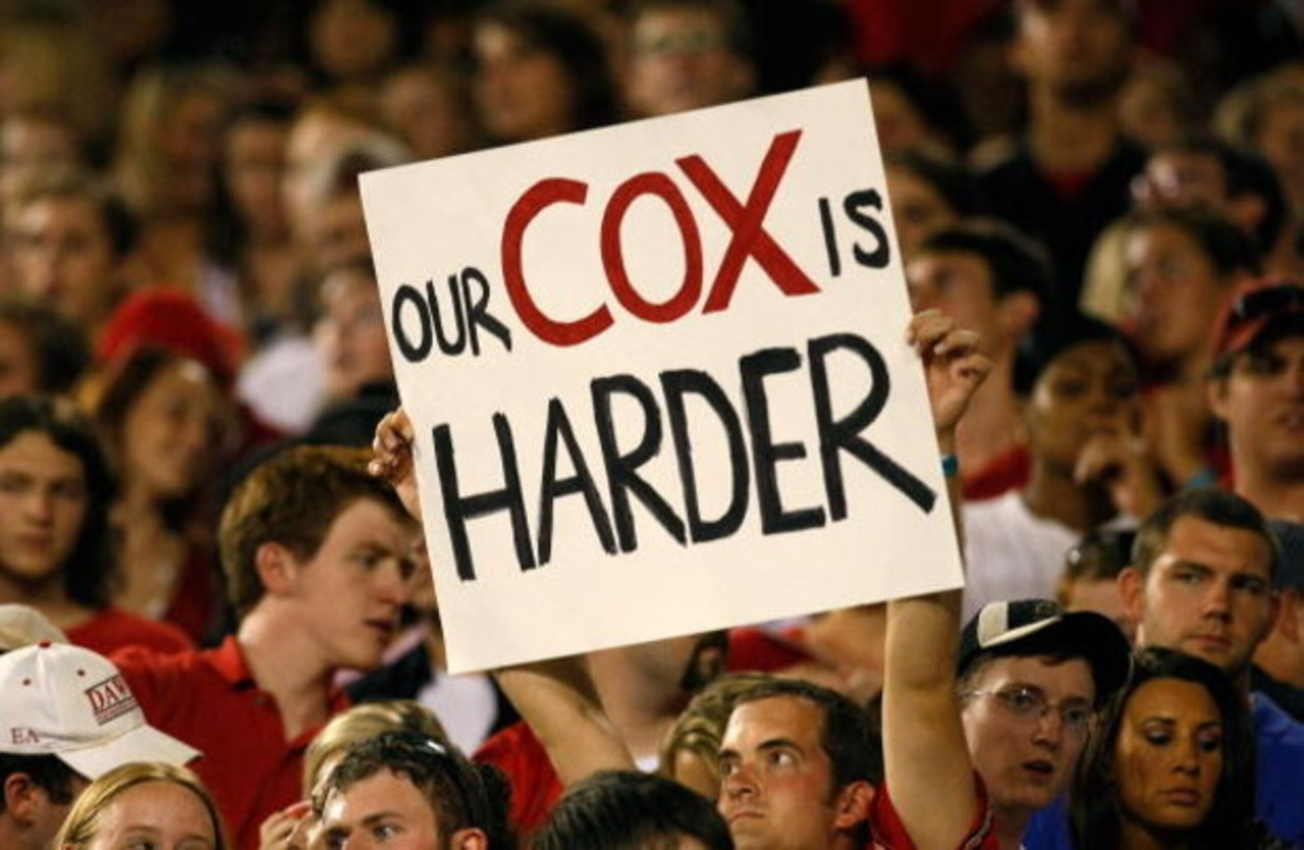 ATHENS, GA - SEPTEMBER 12:  A fan of the Georgia Bulldogs holds up a sign about quarterback Joe Cox #14 (not pictured) during the game against the South Carolina Gamecocks at Sanford Stadium on September 12, 2009 in Athens, Georgia.  (Photo by Kevin C. Co
