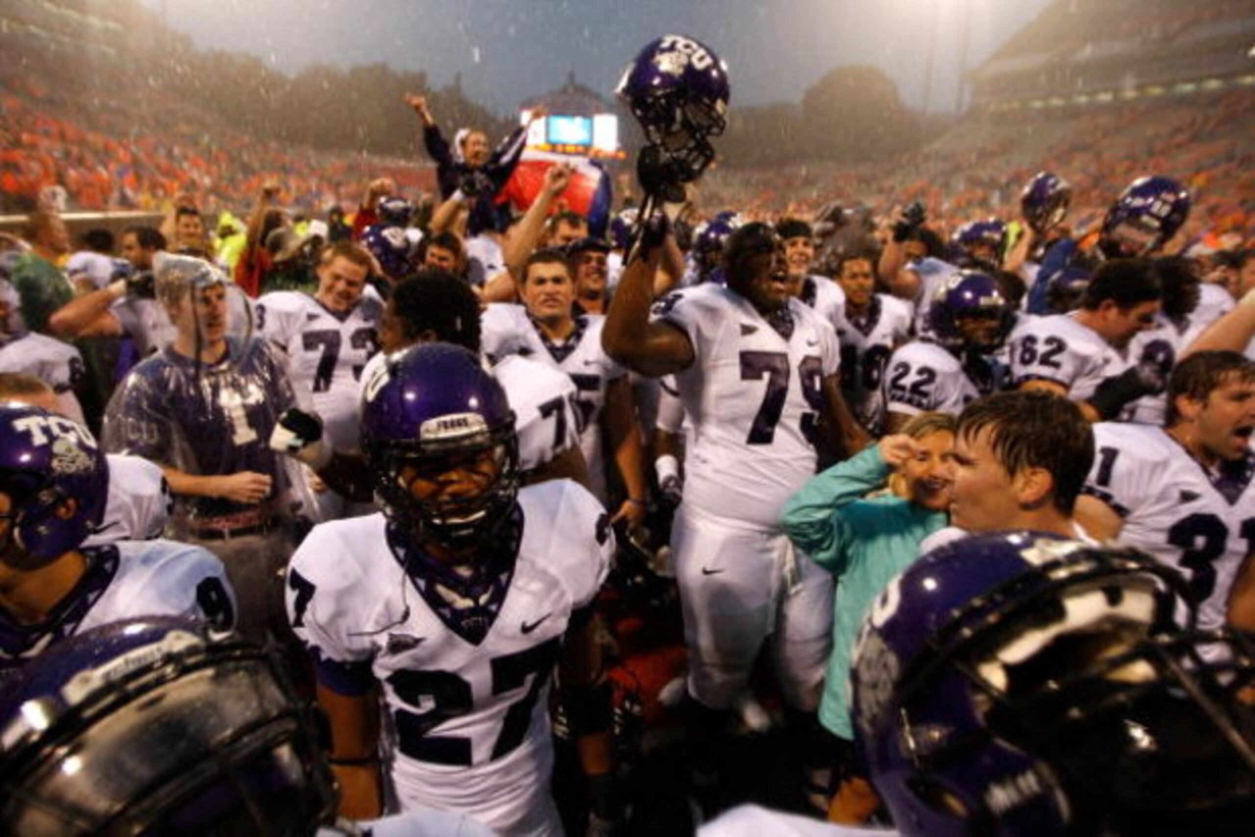 CLEMSON, SC - SEPTEMBER 26:  Team members of the TCU Horned Frogs celebrate after a 14-10 victory over the Clemson Tigers during their game at Memorial Stadium on September 26, 2009 in Clemson, South Carolina.  (Photo by Streeter Lecka/Getty Images)
